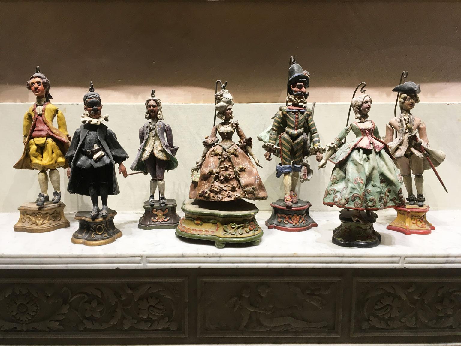 This is an  extraordinary set of seven Puppets depicting the characters of the Venetian Art Comedy of Art in the theater,  the Doctor, the Miserly, the Captain, the Brother and then Isabella, Silvia and Leandro, young people in love.
These rare