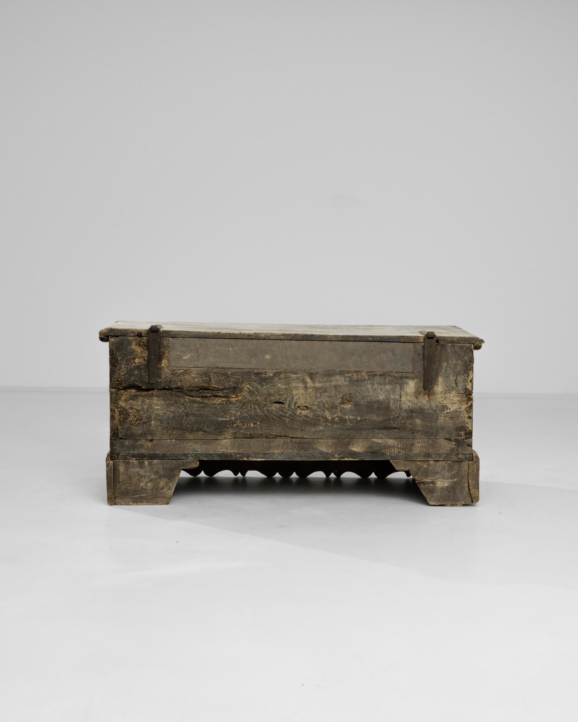 Transport your space to the 1750s with the French Bleached Oak Trunk, a captivating piece that echoes the sophistication of its era. The bottom of the trunk boasts incredible ornate details, showcasing the exquisite craftsmanship of the time. With a