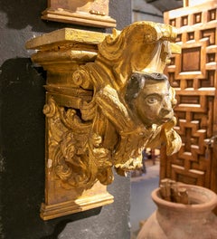 Coppia di mensole barocche del 1750 intagliate e dorate con cherubini