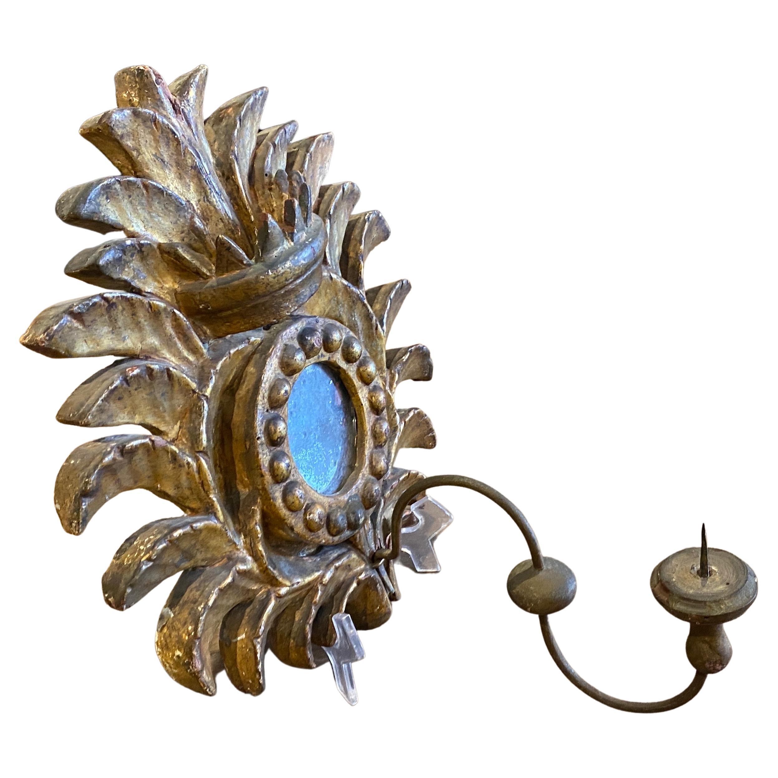 A pair of antique Louis XV gilt wood candle sconces manufactured in Sicily in the Mid-18th century, they were used probably for a private church, they are in original conditions and patina.