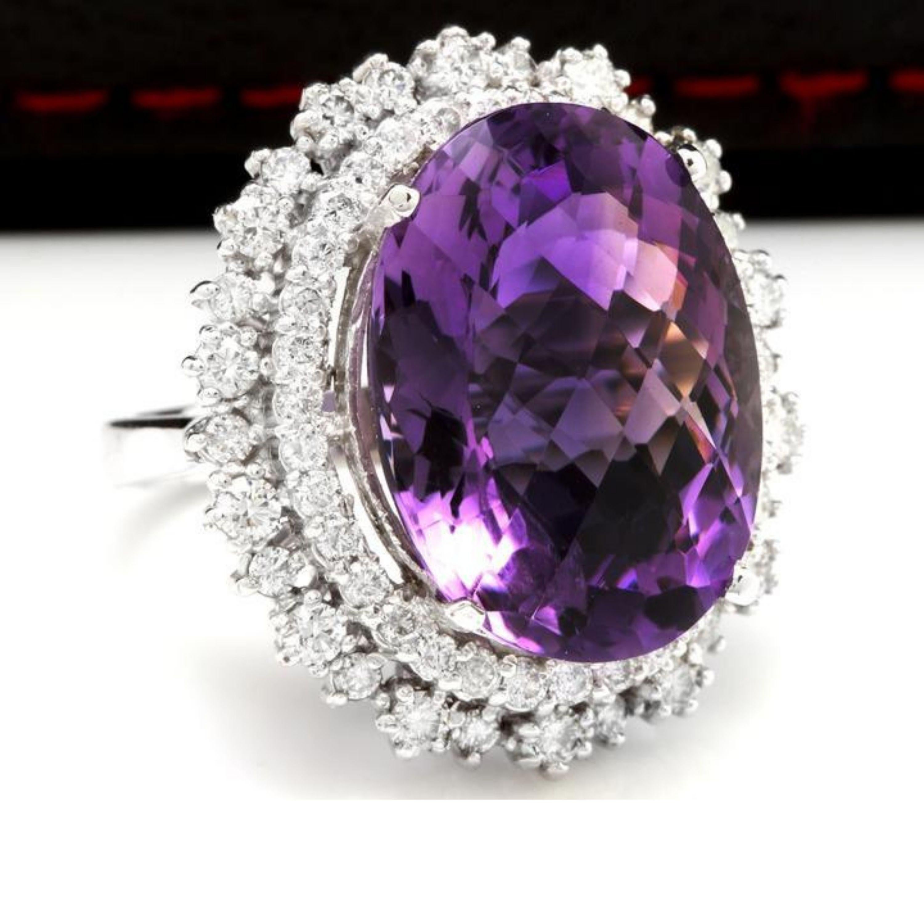 17.52 Carats Natural Amethyst and Diamond 14K Solid White Gold Ring

Total Natural Oval Shaped Amethyst Weights: 15.52 Carats

Amethyst Measures: 19 x 14mm

Natural Round Diamonds Weight: 2.00 Carats (color G-H / Clarity SI1-SI2)

Ring size: 7 (we