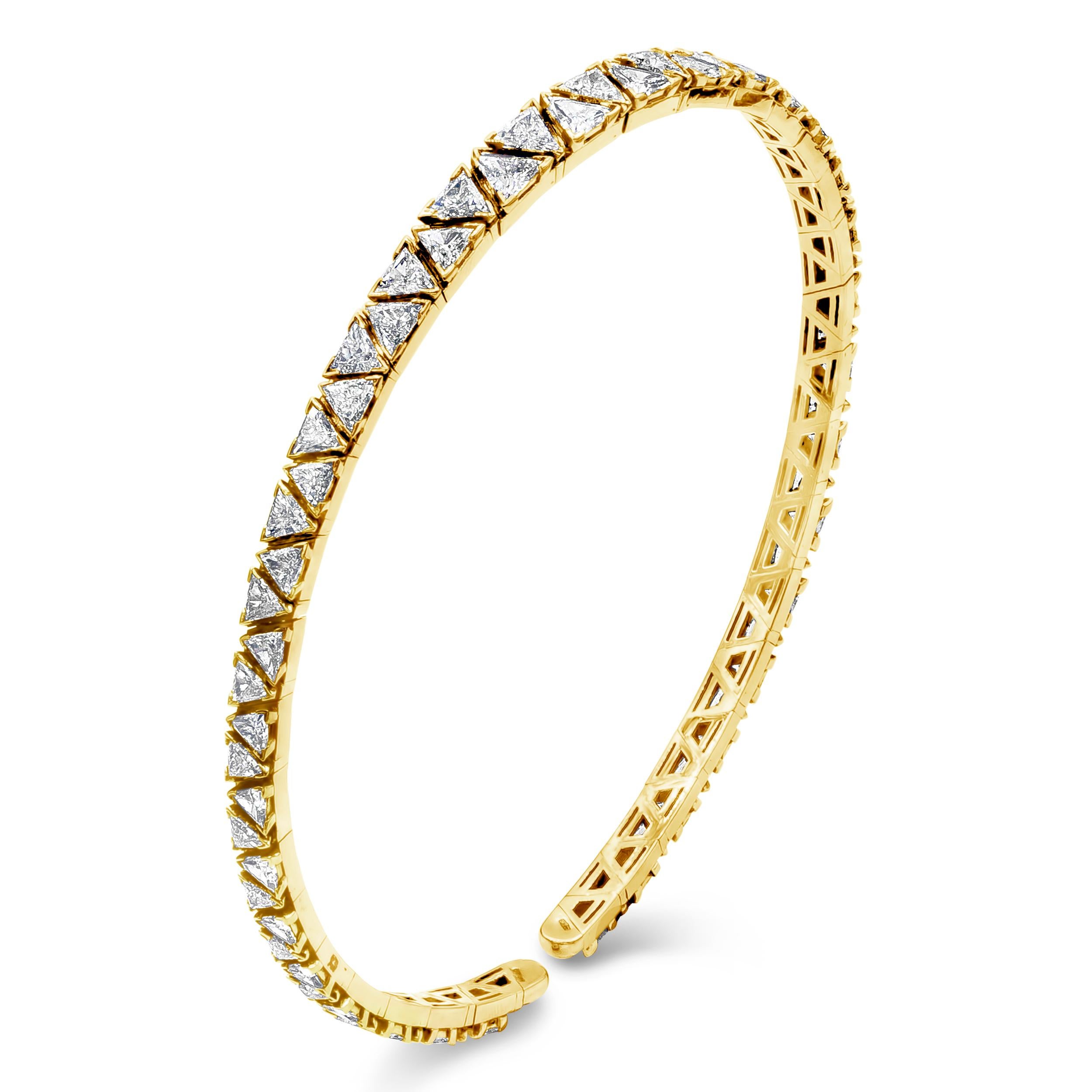 A unique piece of jewelry showcasing a row of trillion diamonds weighing 17.57 carats, set in choker style necklace. Made in 18 karat yellow gold.

