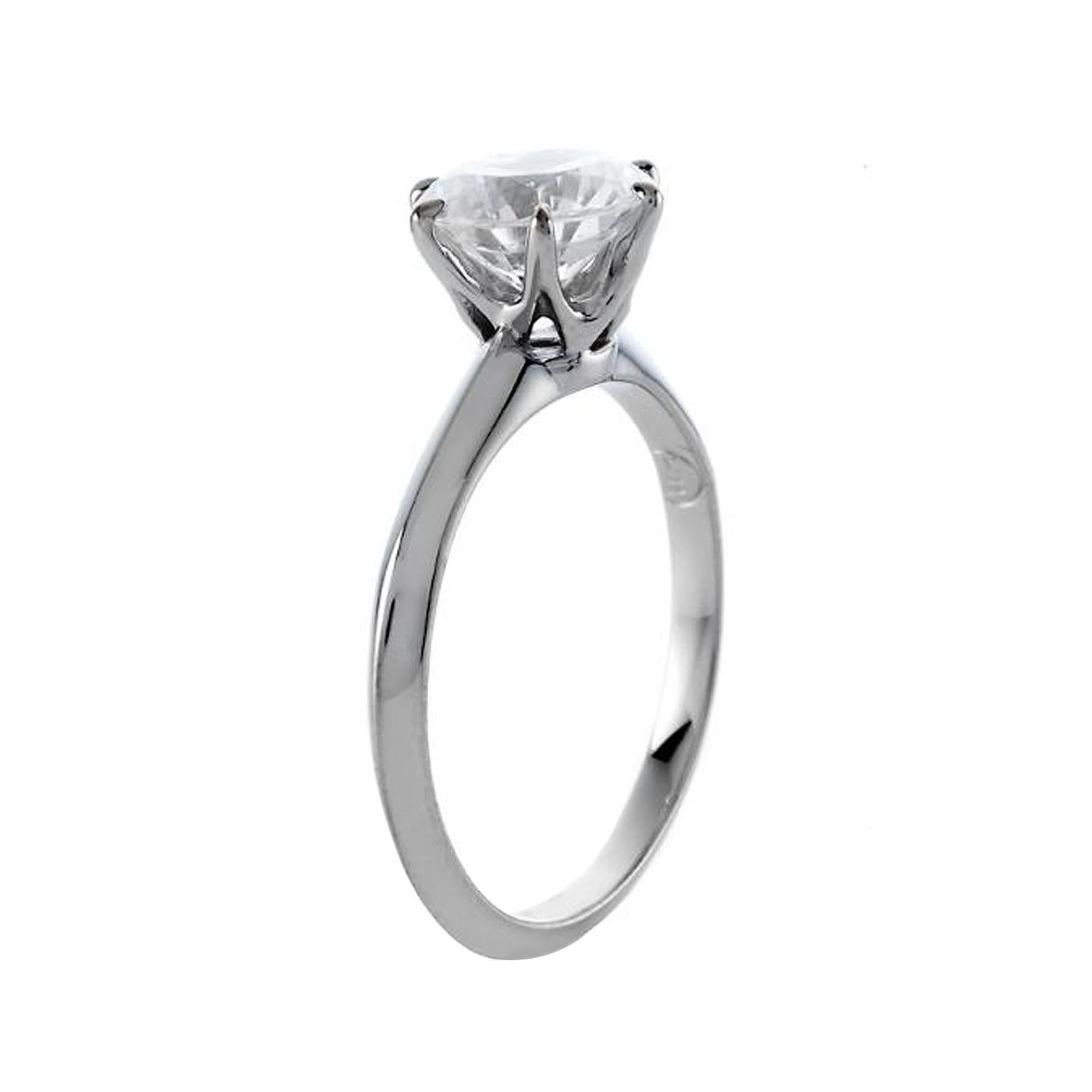 This 1.75-carat round diamond Tiffany Style Setting is the most iconic engagement ring, a true design masterpiece. Flawlessly engineered with Si2 clarity grade and L color grade, the six-prong setting virtually disappears and allows the brilliant