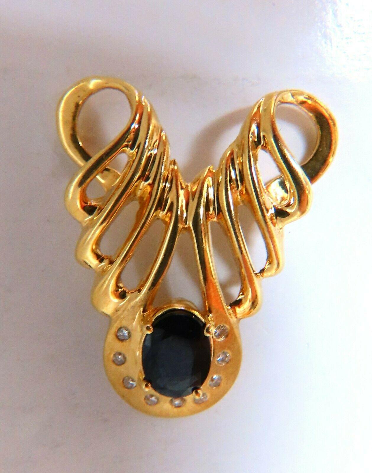Wave Pattern Sapphire Slide Pendant

Made For Omega Cable Necklace 
1.75ct Natural Round Dark Midnight blue sapphire.

Oval Cut, Clean Clarity & Transparent.

5.7 grams

14kt yellow gold

Pendant measures: 30 x 25mm

will accept 8mm chain

