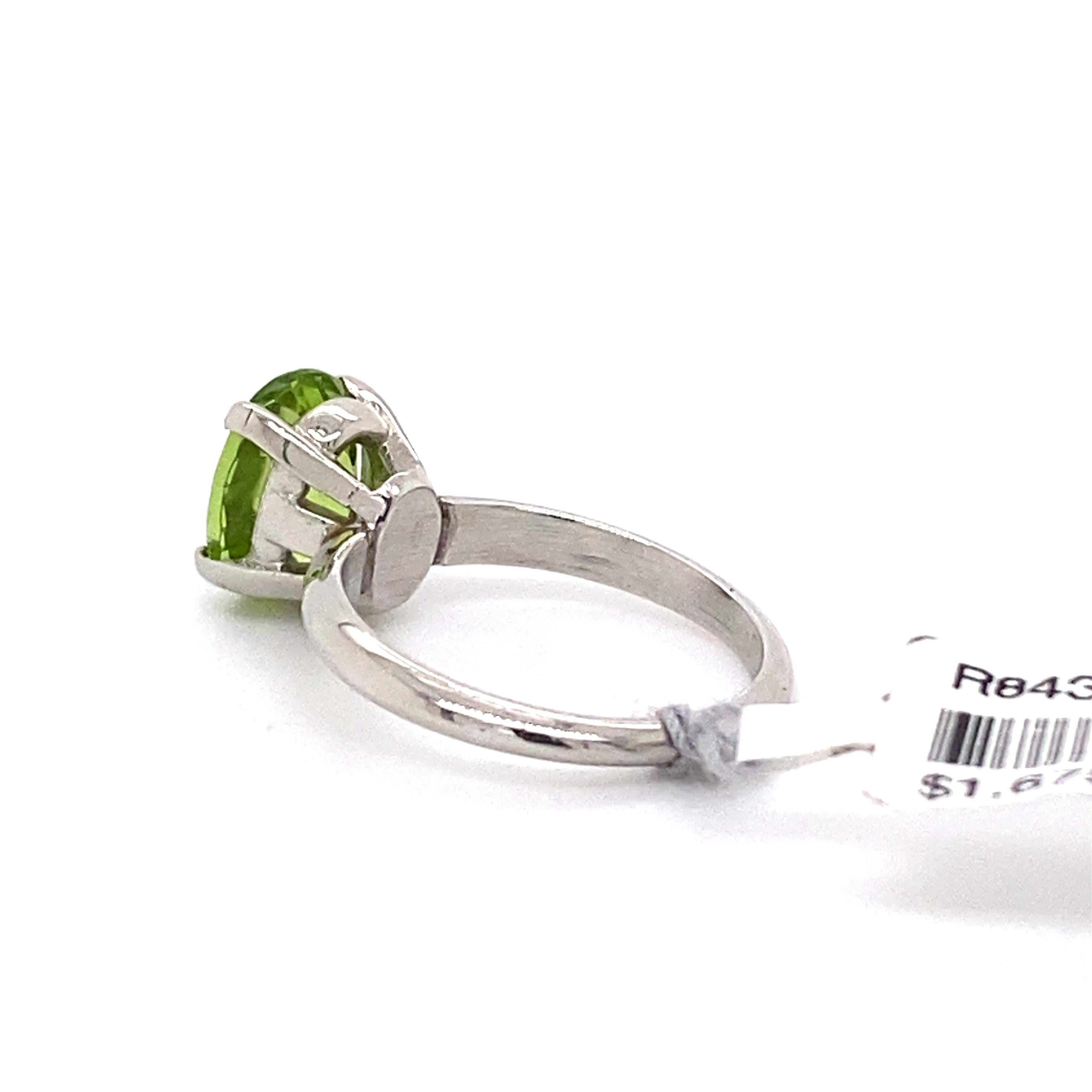 Oval Cut 1.75ct Peridot and Platinum Solitaire Ring