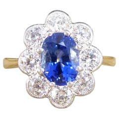 1.75ct Sapphire and 0.85ct Total Diamond Cluster Ring in 18ct Gold