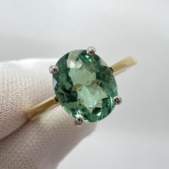 Anello solitario in oro giallo bianco 18 carati con tormalina verde blu vivo da 1,75 carati con taglio ovale