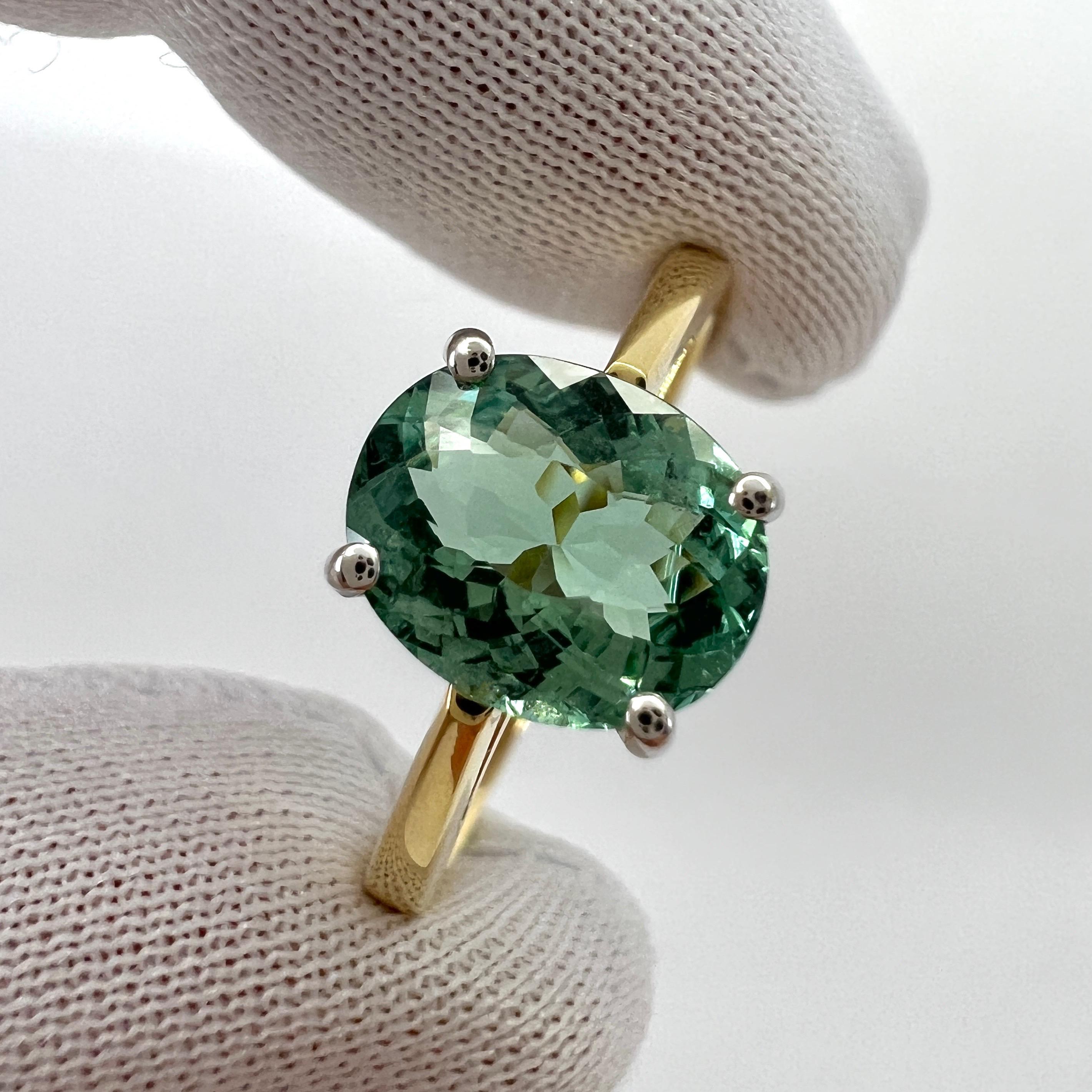 Bague solitaire en or jaune et blanc 18 carats avec tourmaline bleu vif et vert taille ovale de 1,75 carat Pour femmes en vente