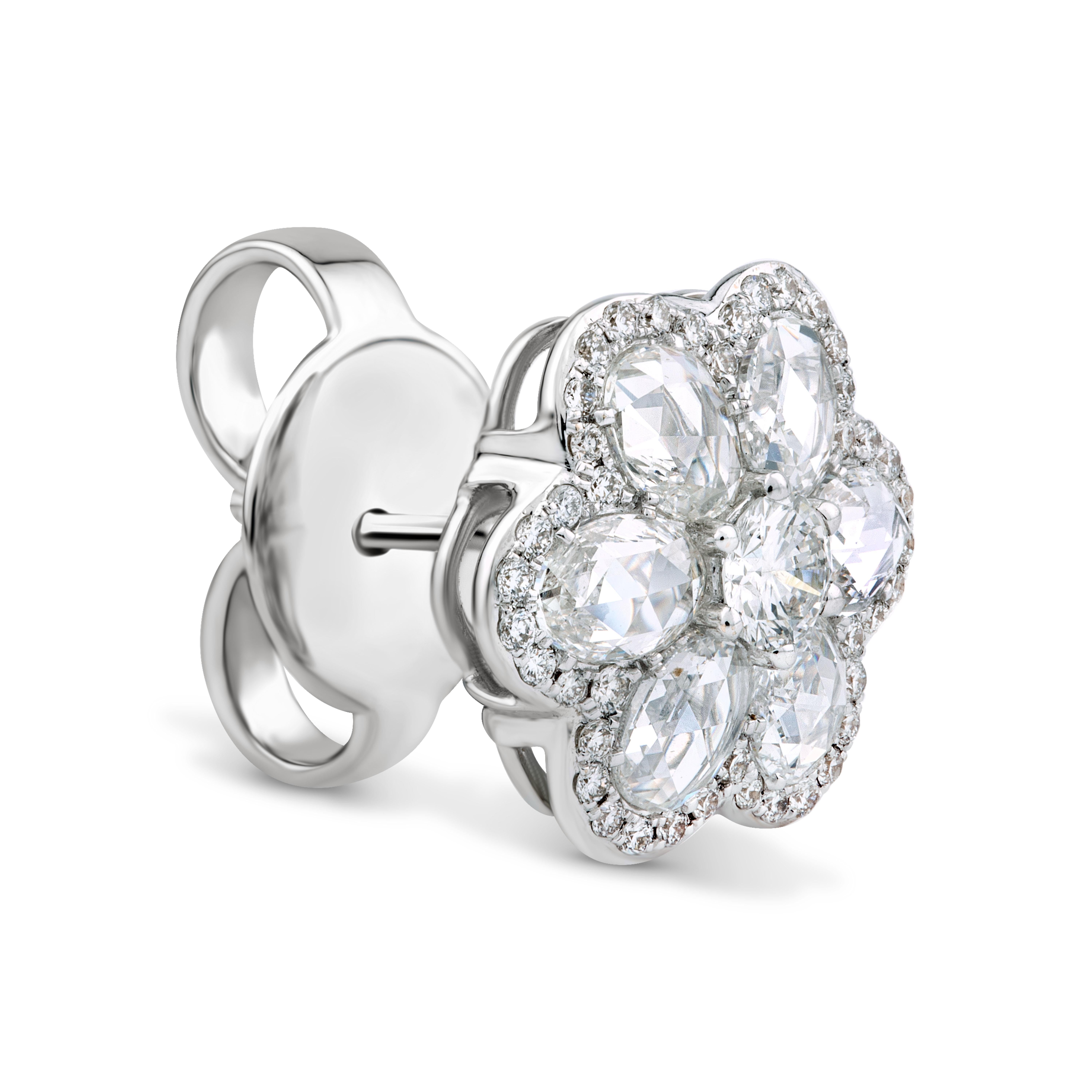 Part of Rarever's 'Blossom' Collection, these ear studs, beautifully crafted and playful in design, celebrate the joys of spring. Combining 12 oval rose cuts with 86 round brilliant cut diamonds for extra sparkle.

Total diamond weight: