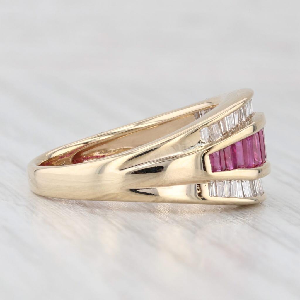 Gemstone Information:
- Natural Diamonds -
Total Carats - 0.75ctw
Cut - Baguette
Color - H - I
Clarity - VS2 - SI2

- Natural Rubies -
Total Carats - 1ctw
Cut - Baguette
Color - Red
Treatment - Routinely Enhanced

Metal: 14k Yellow Gold 
Weight: 5.2