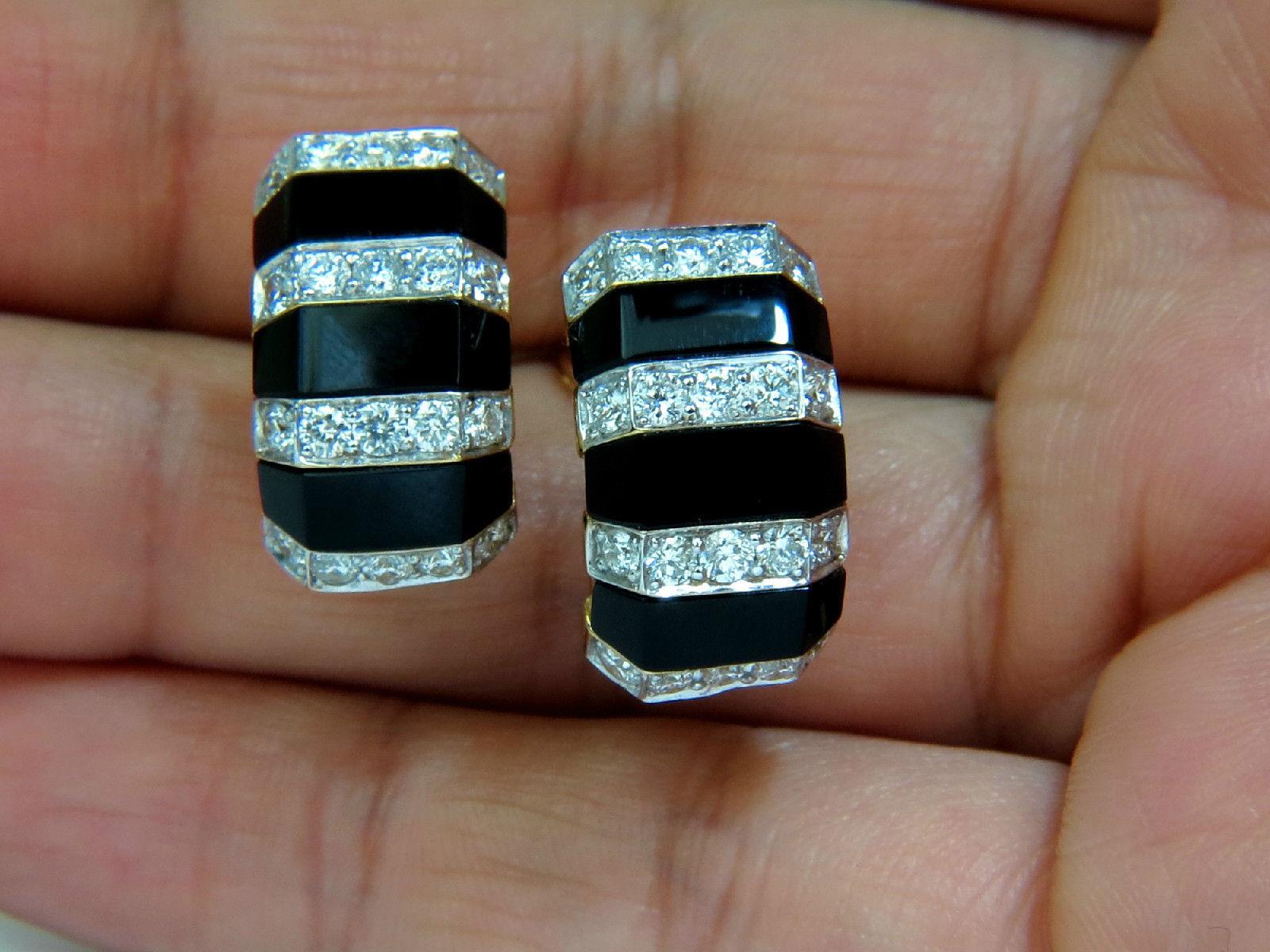 Natural Carved Onyx diamond clips.

  1.76ct. Round Brilliant diamonds. 

 Full cuts.

G color Vs-2 clarity. 



11.3 X 19.8mm

 18.4 grams.

14kt. yellow gold.

$6,000 appraisal will accompany