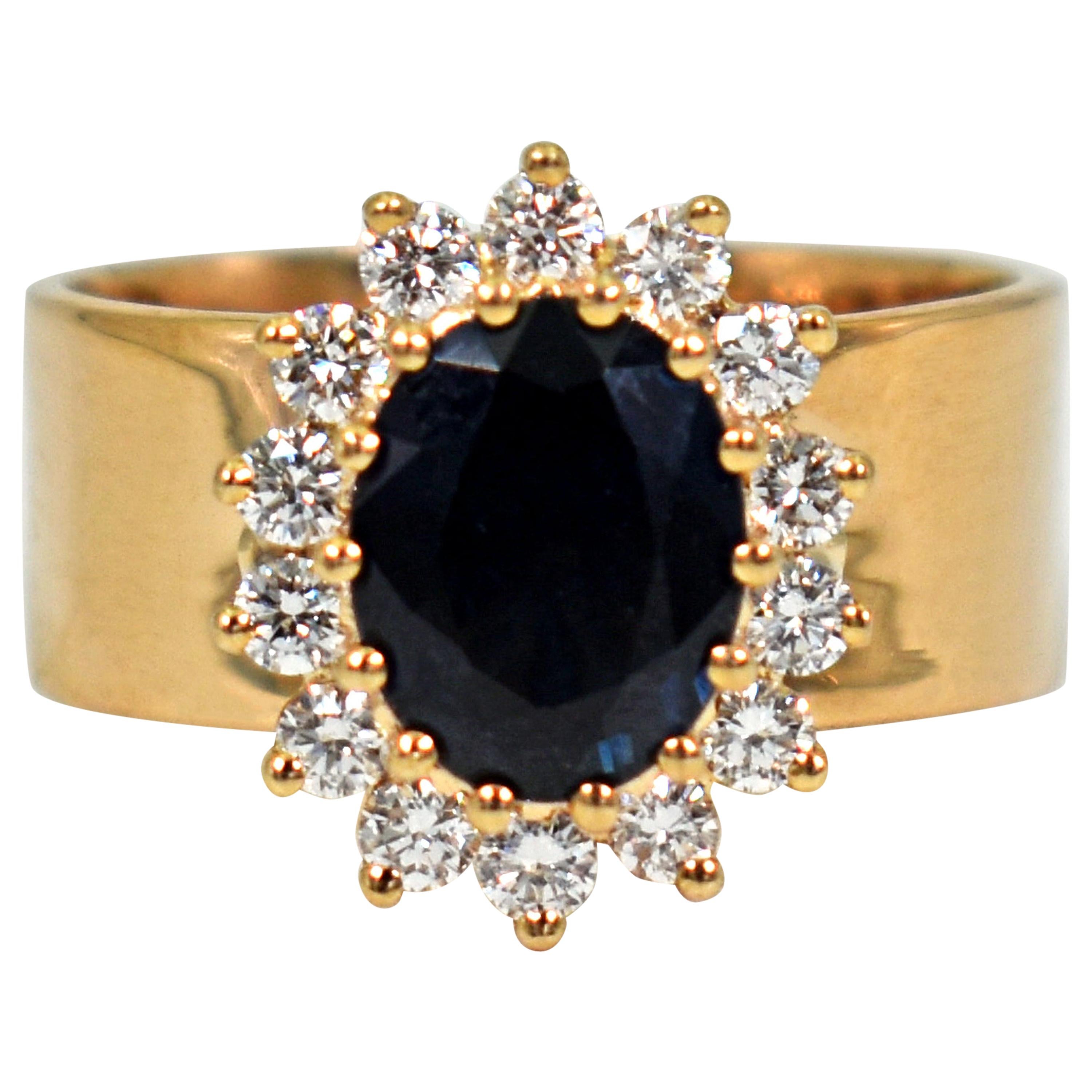 1.76 Carat Oval Blue Sapphire Diamond Halo 18 Karat Gold Cocktail Ring For Sale