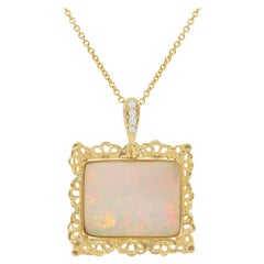 Colgante de oro amarillo de 18 quilates con ópalo talla esmeralda y diamante blanco redondo de 17,60 quilates