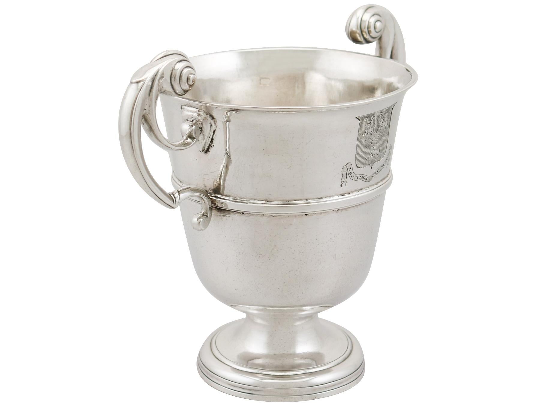 An exceptional, fine and impressive, rare antique Irish sterling silver loving cup, made in Cork by George Hodder; an addition to our ornamental silverware collection.

This exceptional antique Irish sterling silver loving cup has a plain bell