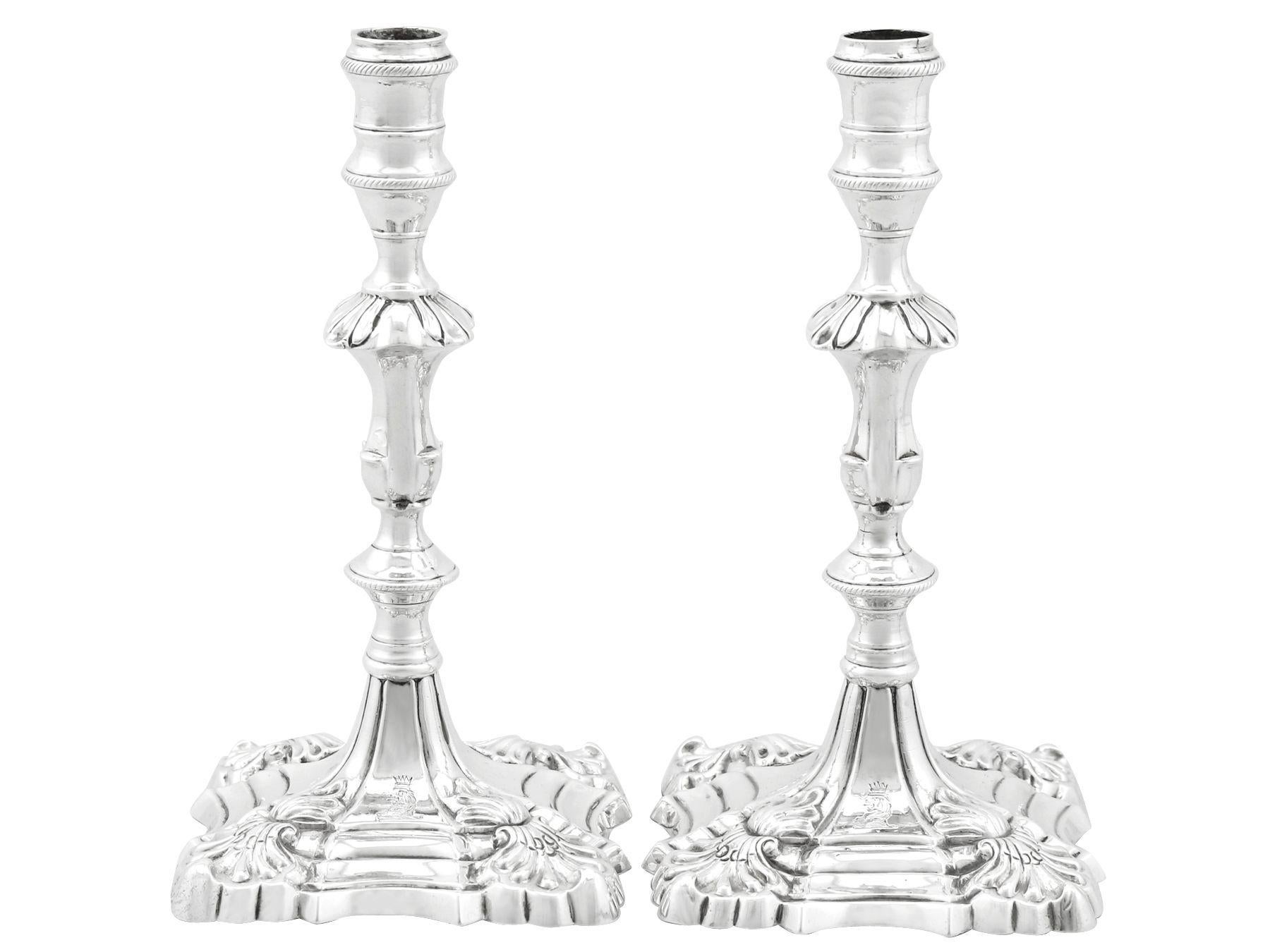 An exceptional, fine and impressive pair of antique George III English cast sterling silver tapersticks; an addition of our ornamental Georgian silverware collection

These exceptional antique George III cast sterling silver taper candlesticks