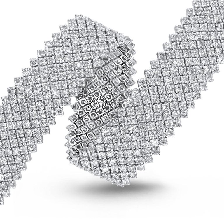 The picture of classic elegance, this tennis bracelet features 17.61 carats round diamonds, densely set in a strap pattern. Set in 18k White Gold.
Suggested retail price: $57800

Diamond Town is pleased to offer a wide selection of fine jewelry