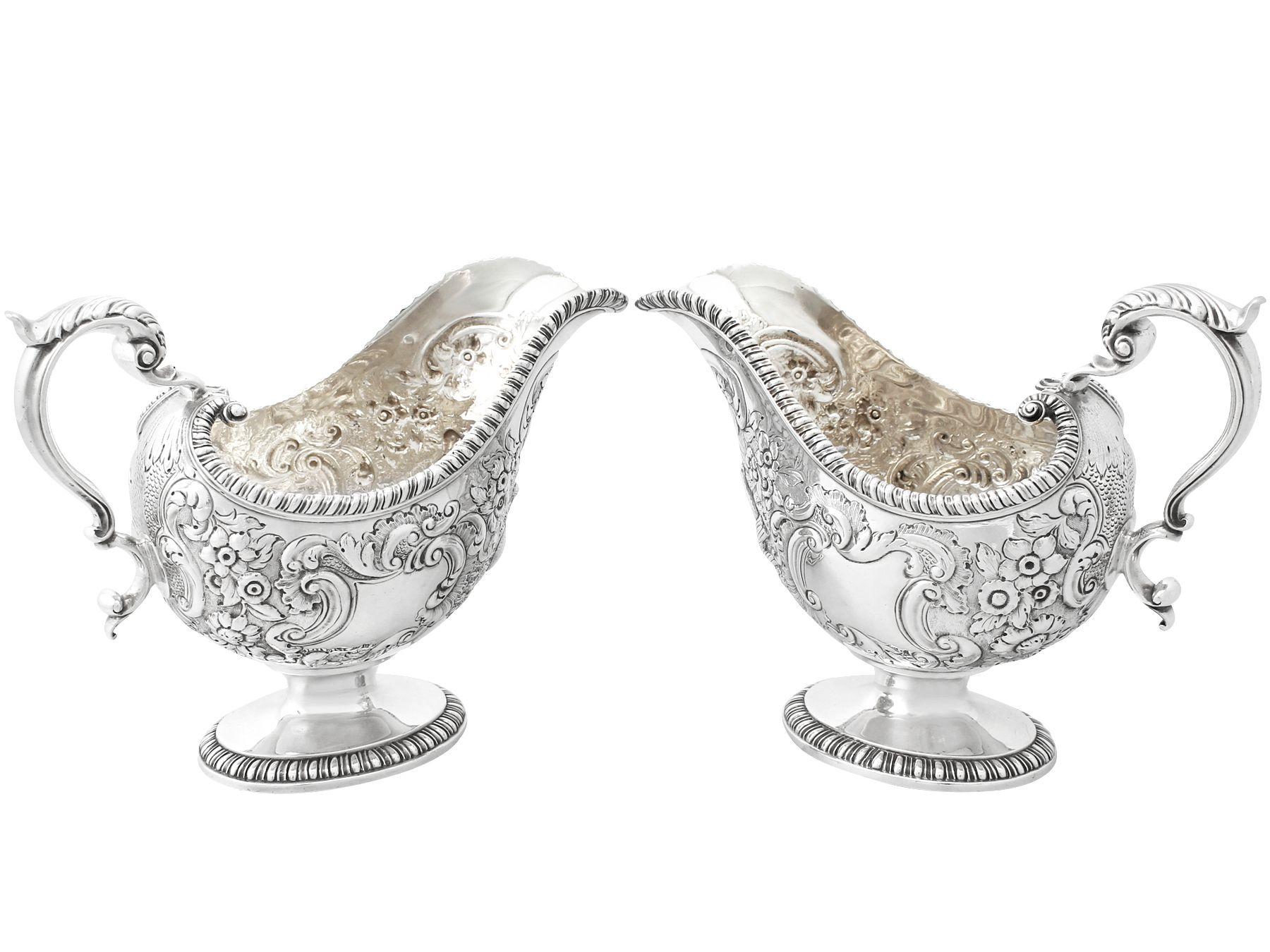 An exceptional, fine and impressive pair of antique Georgian English sterling silver sauceboats; an addition to our dining silverware collection

These exceptional antique George III sterling silver sauceboats have an oval rounded form in the