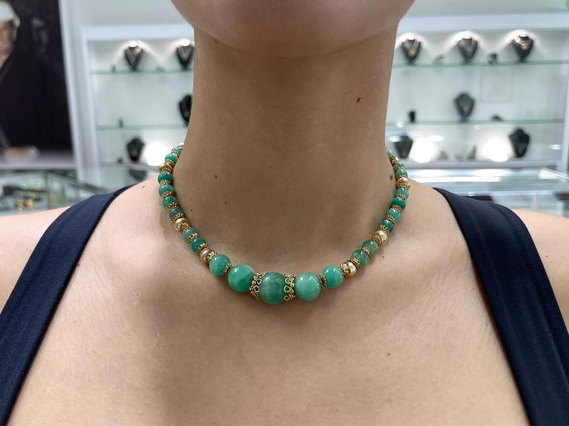 A beautiful and large emerald bead necklace. This simple and stylish necklace features natural Colombian emerald hand-polished beads. The largest emerald measures 15.6mm x 15.6mm weighing an estimated 28 carats alone. Numerous emeralds will