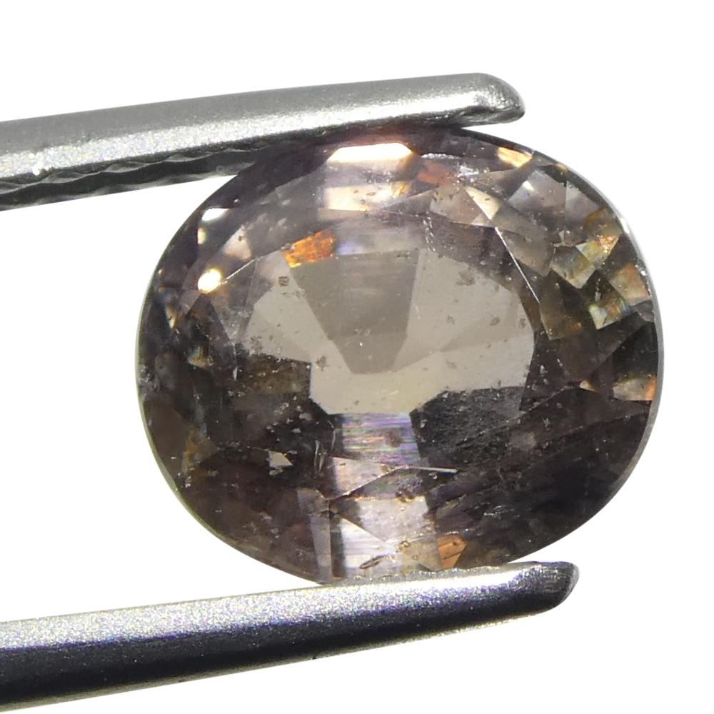 1,76ct Ovaler gräulich-rosa Saphir aus Tansania im Angebot 8