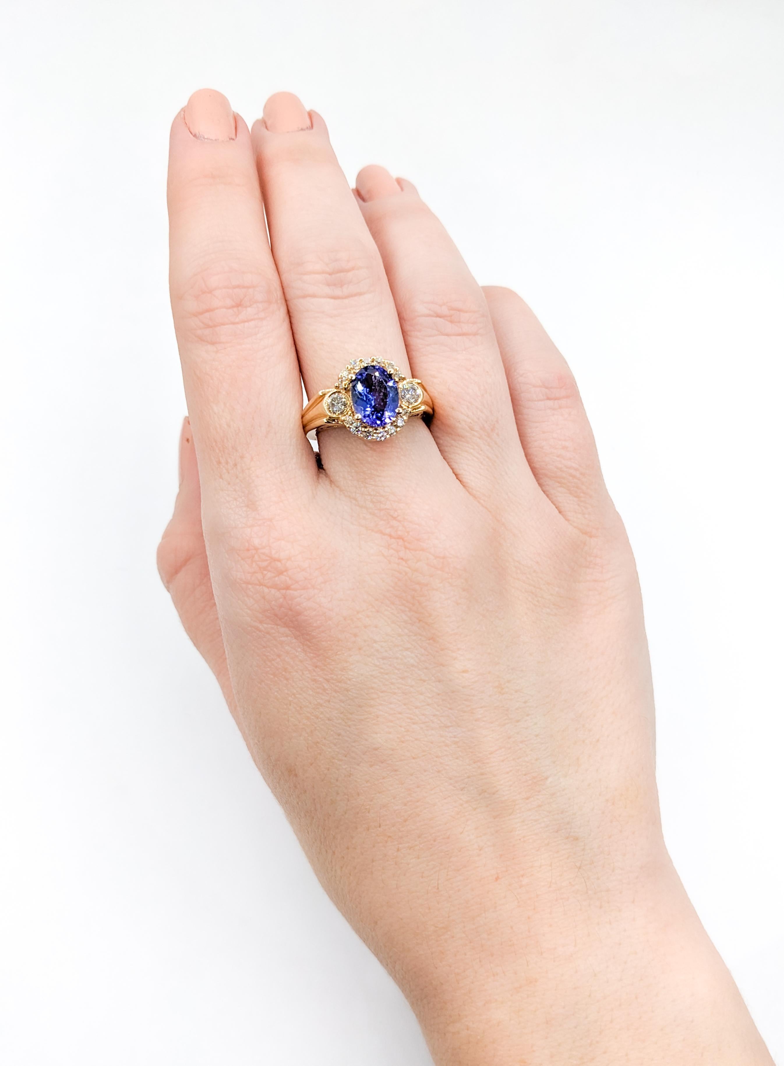 Indigo 1.76ct Oval Tanzanite & Diamond Cocktail Ring

Introducing this striking Tanzanite ring is expertly fashioned in 14k yellow gold. This piece showcases a lovely 1.76ct oval Tanzanite Gemstone at its heart. Complimenting the Blue-Purple of the