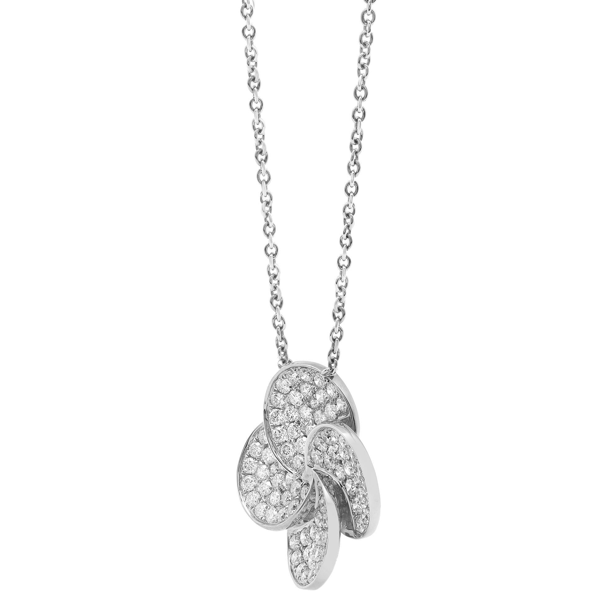 This fabulous dazzling diamond flower pendant necklace is a perfect accent to every day and evening look and gives a touch of chic to any ensemble you pair it with. It features pave set round brilliant cut diamonds weighing 1.76 carats. Diamond