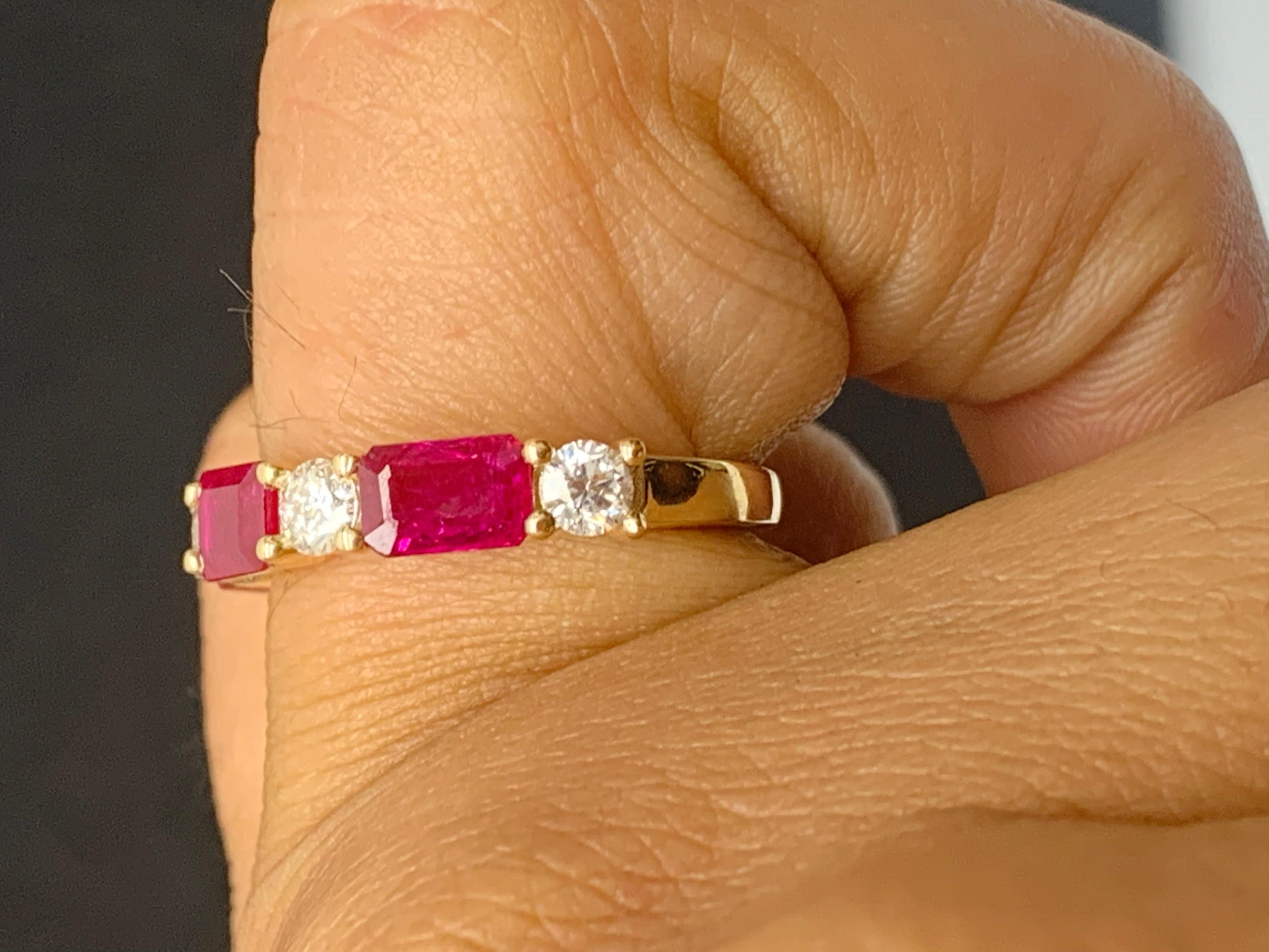 Handcrafted to perfection; showcasing color-rich emerald cut red rubies that elegantly alternate round diamonds in a 14k yellow gold setting. 
The 3 Rubies weigh 1.77 carats total and 4 diamonds weigh 0.60 carats total.

Size 6.5 US (Sizable). One