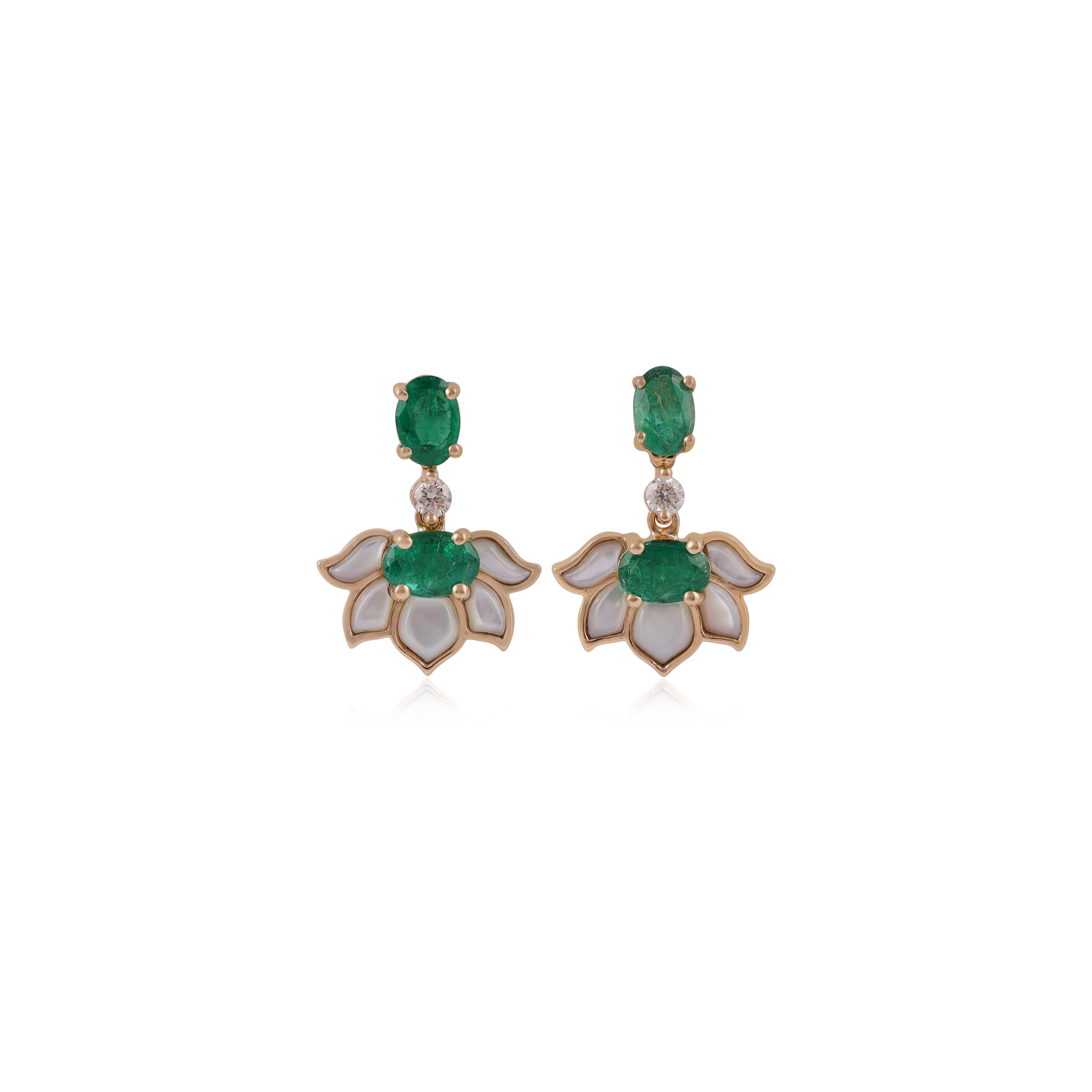 A beautiful pair of Clear Emerald Oval cuts. This pair of earrings has custom-cut (1.55 Carat)  Mother Of Pearl set in a Lotus pattern & (0.12Carat) Diamond . These  Mother Of Pearl stations are surrounded by(1.77 Carat) Emerald  & (4.56 Gram)