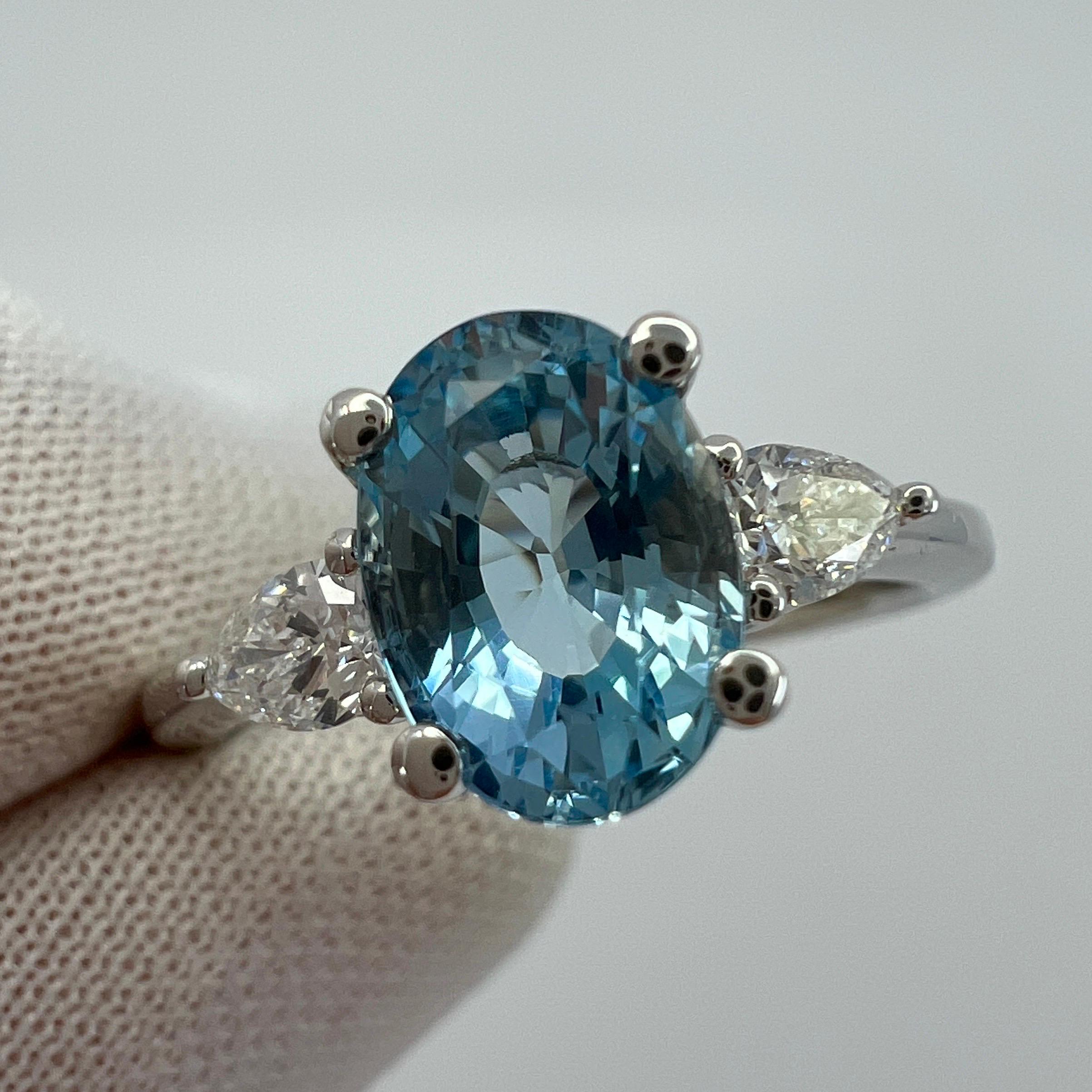 Fine Santa Maria Blue Aquamarine & Diamond 18k White Gold Oval Three Stone Ring.

Stunning 18k white gold ring with a beautiful fine Santa Maria blue aquamarine weighing 1.35ct.
Accented by two matching pear cut diamonds. 0.42ct F/G colour and Si2