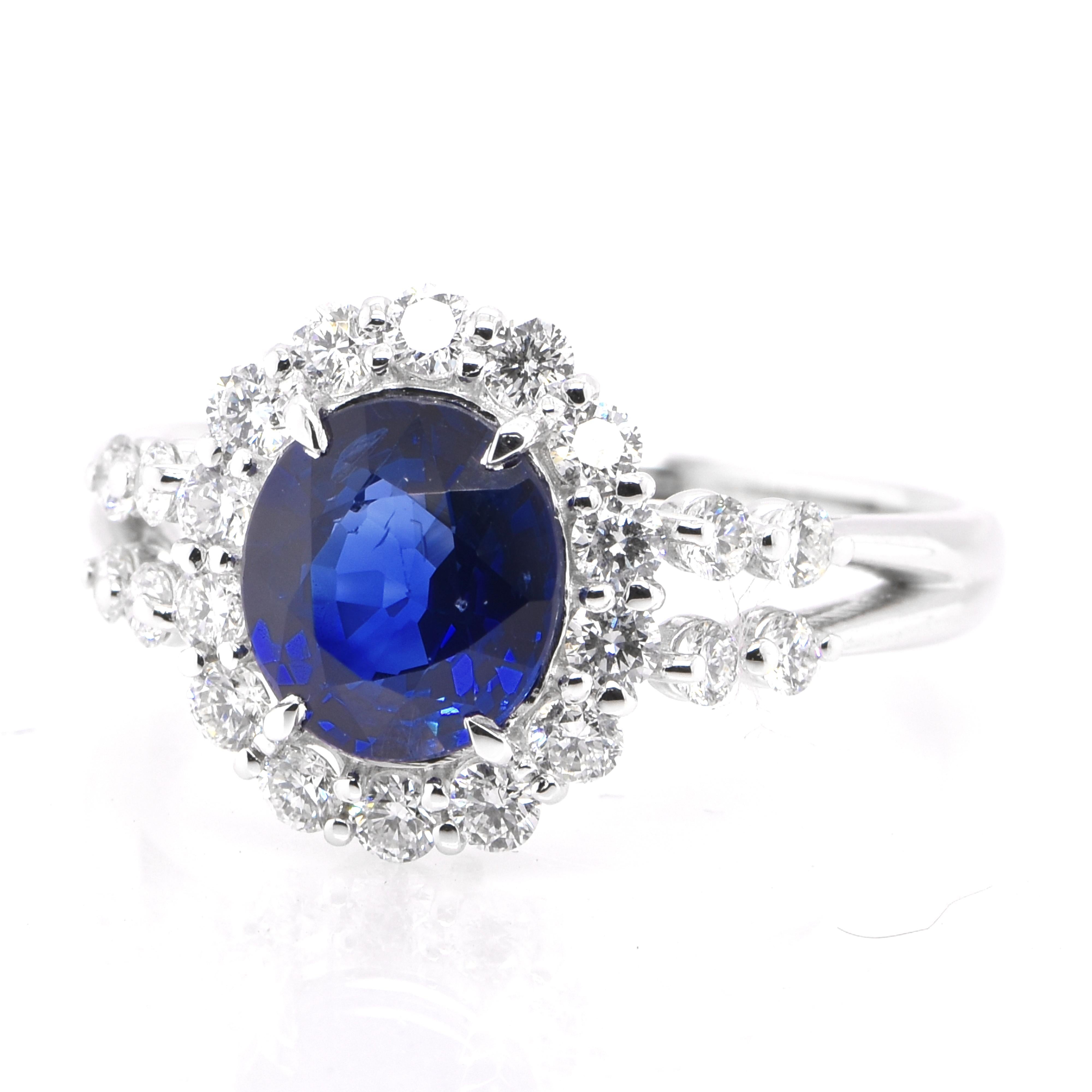 A beautiful ring featuring GIA Certified 1.77 Carat Natural Blue Sapphire from Madagascar and 0.59 Carats Diamond Accents set in Platinum. Sapphires have extraordinary durability - they excel in hardness as well as toughness and durability making