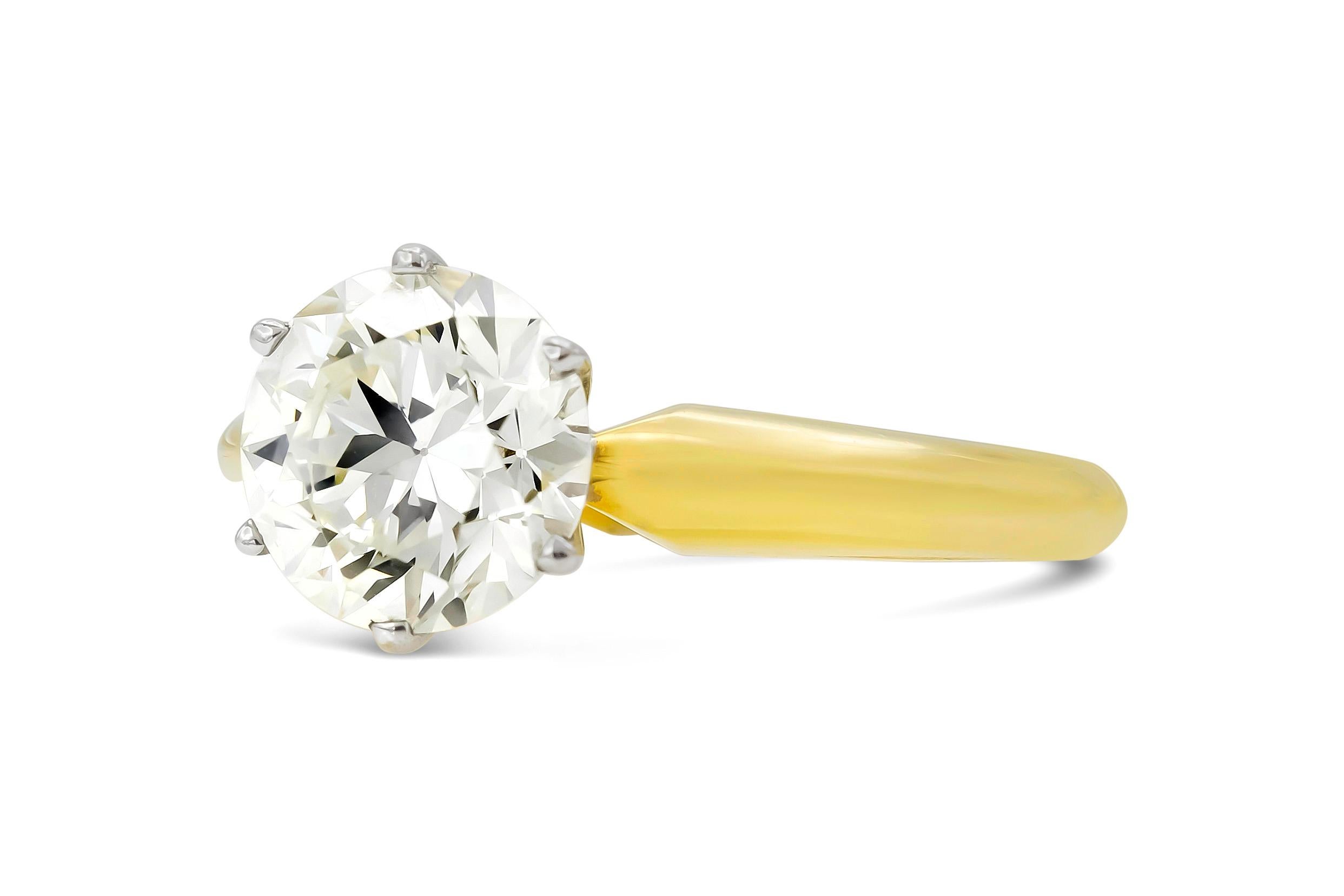 Finely crafted in 18k yellow and white gold with an Old European cut diamond weighing 1.77 carats.
K color, VS1 clarity
Size 6, resizable