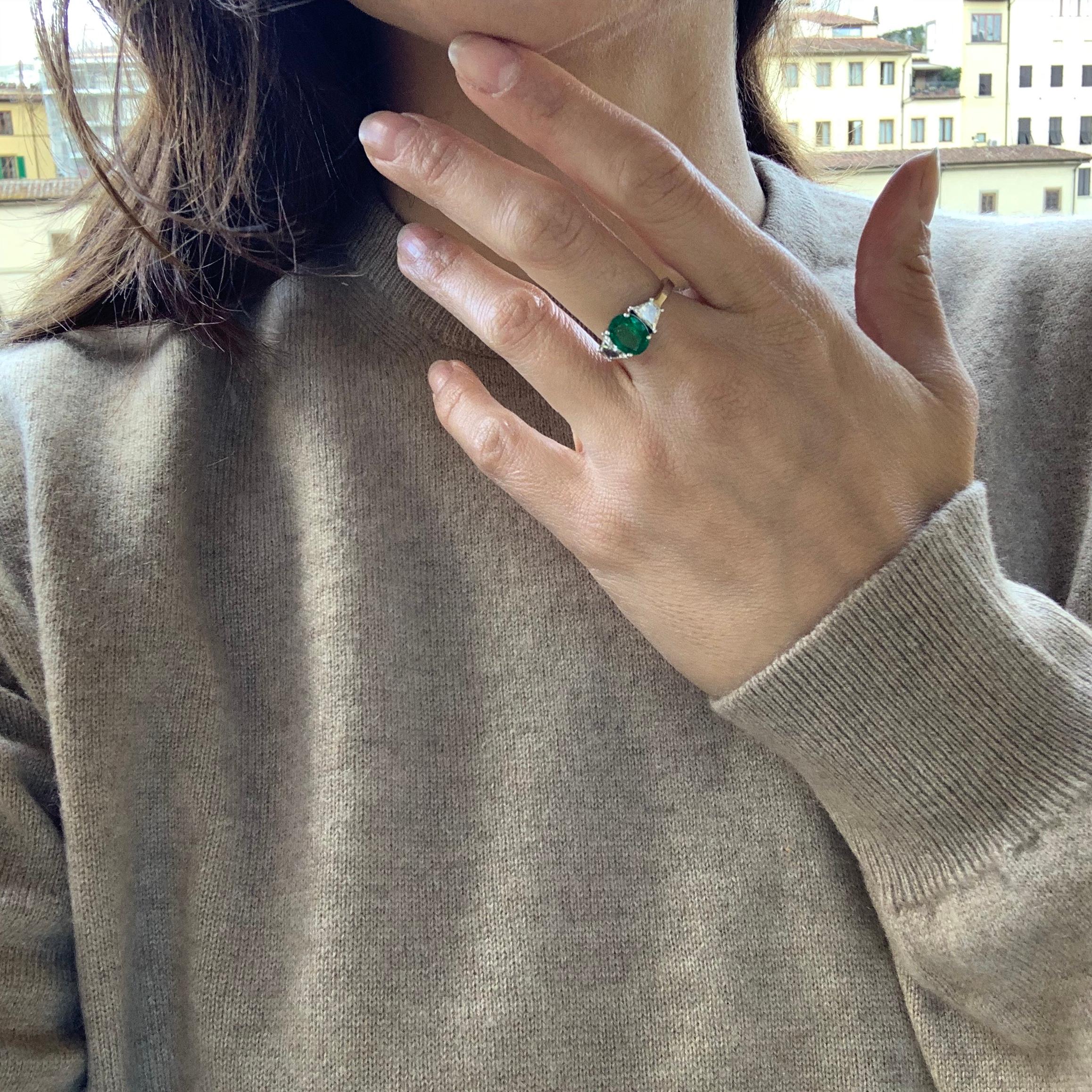 1.77 Carat Oval Emerald and Baguette Diamond Cocktail Ring 1