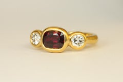 Oval Ruby & Round Diamond 3-Stone Ring