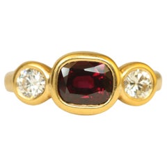 1.77 Carat Oval Ruby & 0.46 Carat Round Cut Diamond 22K Yellow Gold 3-Stone Ring