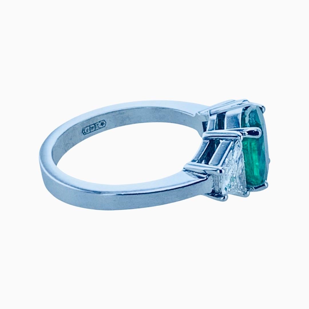 This 1.77 Carat Oval Emerald with 2 Baguette Diamonds either side, it the perfect Cocktail Ring to dress up any finger. 

Set in an 18Kt white Gold ring, it can be made 3 ring sizes larger and 3 ring sizes smaller. 

Crafted, designed and certified