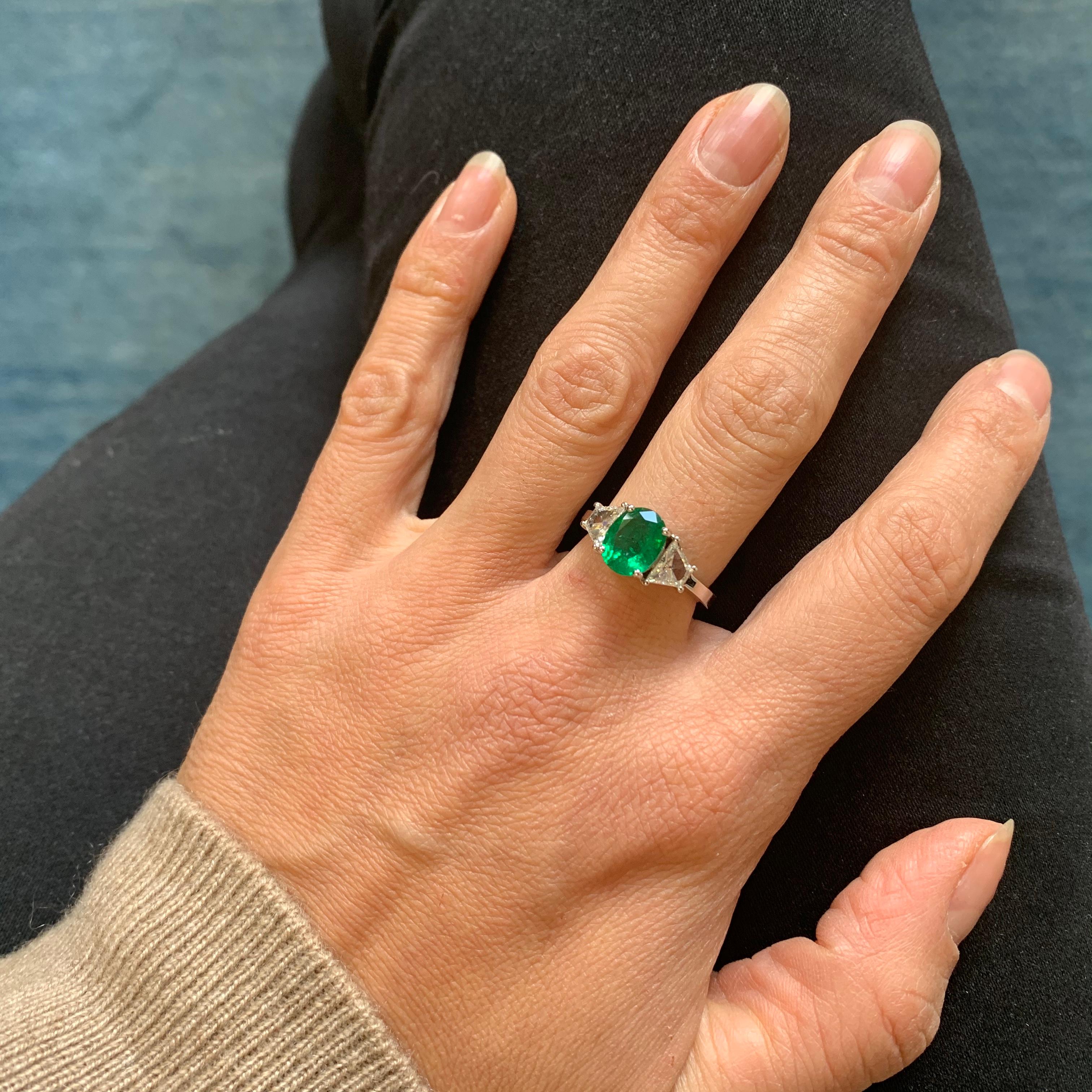 Round Cut 1.77 Carat Oval Emerald and Baguette Diamond Cocktail Ring