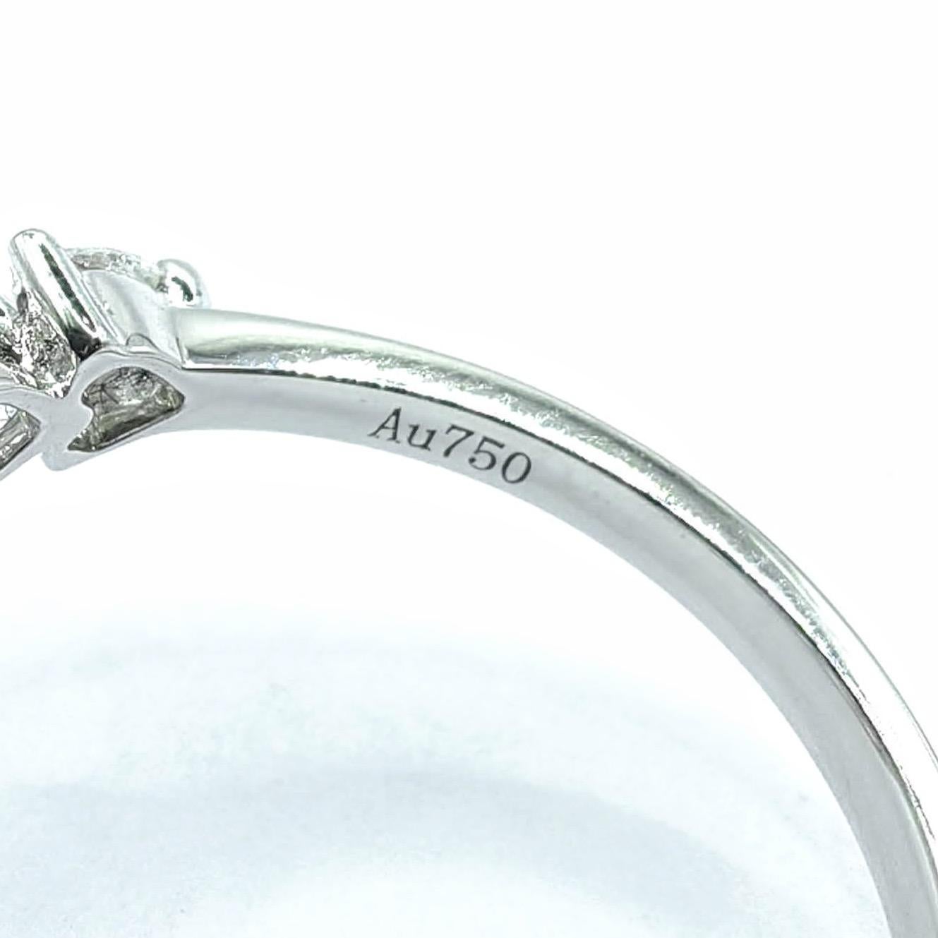 En vente :  Bague bypass en or blanc 18 carats 10 diamants taillés en cœur 7