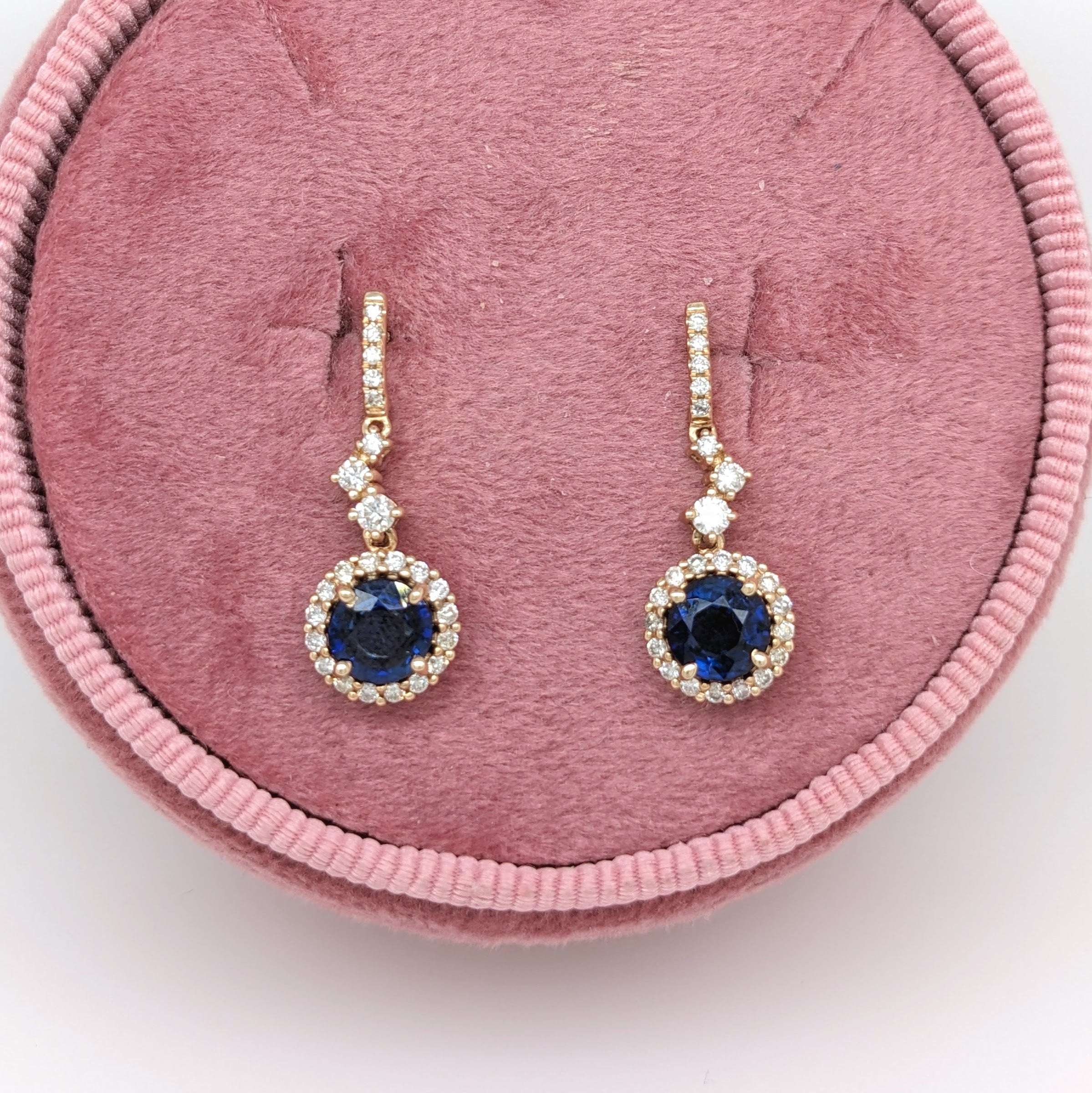 Specifications:

Item Type: Earring
Type: Sapphire
Treatment: Diffused
Size: 6mm
Weight: 2/1.77cts
Shape: Round
Hardness: 9
Metal: 14k/3.07 grams
Diamonds S/I GH: 0.47cts
Sku: AJE051/2495

These earrings are made with solid 14k gold and natural