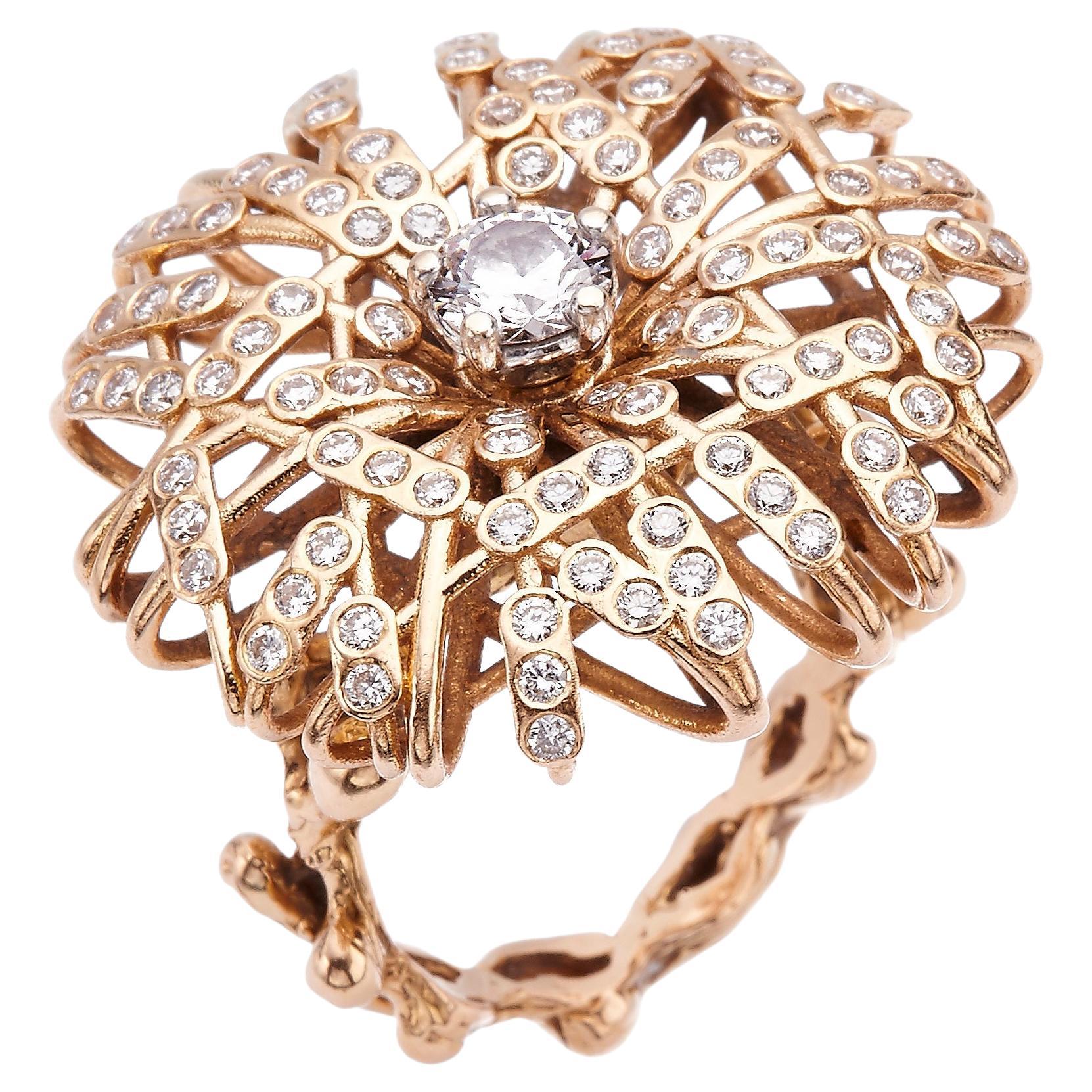 Der Essence Ring: 18K Gold mit rotierendem, diamantbesetztem Kopf - ein Symbol für Erleuchtung und persönliche Transformation.
Entfalte dein göttliches Potenzial mit dem Essenzring. 
Edelsteine und Metalle werden energetisch gereinigt, um ihre