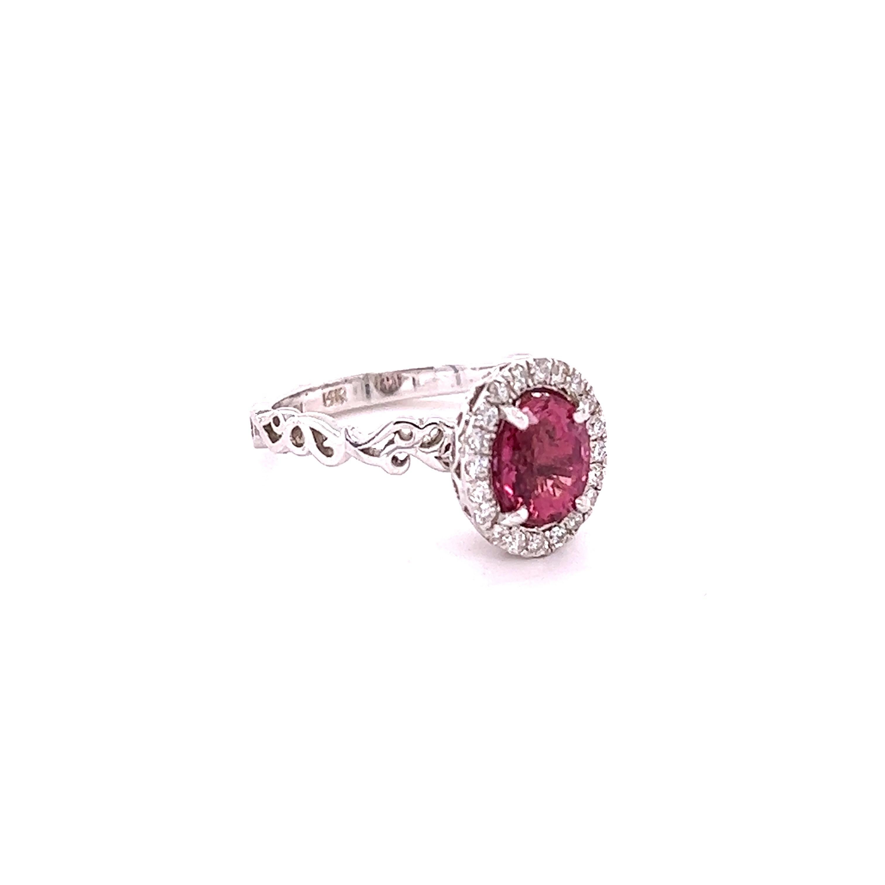 This ring has a Oval Cut Hot Pink Tourmaline that weighs 1.49 Carats and has 20 Round Cut Diamonds that weigh 0.22 carats. The clarity and color of the diamonds are SI-F.
The total carat weight of the ring is 1.77 Carats. 
The Emerald Cut Tourmaline