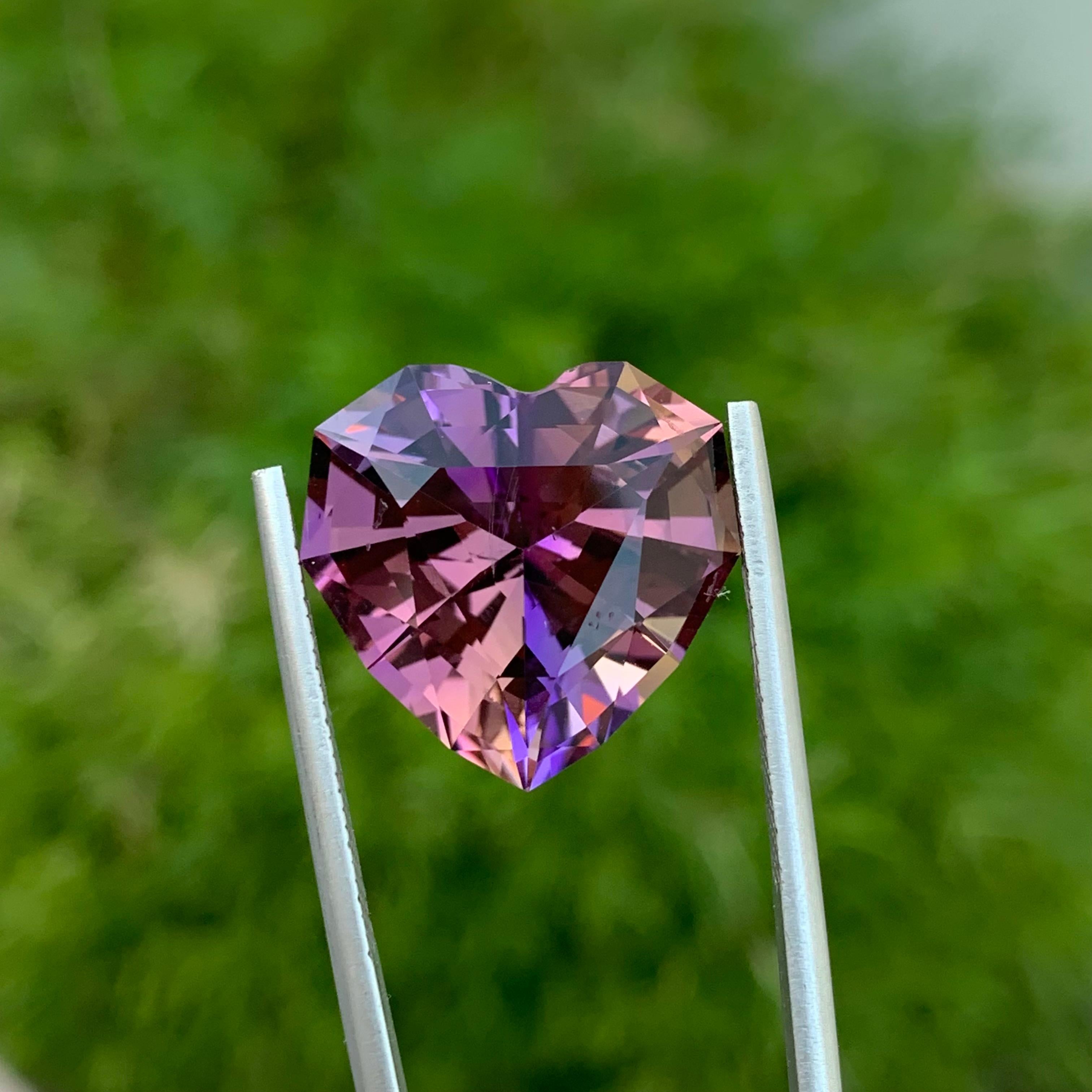 Faceted Ametrine
Weight: 17.70 Carats
Dimension; 17.8 x 18.4 x 11.2 Mm
Origin: Brazil
Color: Purple & Yellow
Shape: Heart 
Treatment: Non
Certficate: On Demand
.
Ametrine is a unique and captivating gemstone that displays a harmonious blend of two