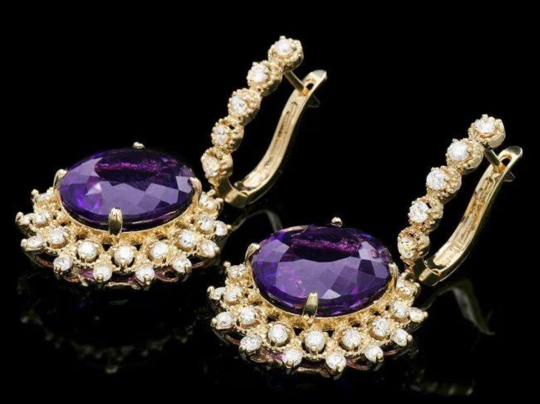 17.70ct Natural Amethyst and Diamond 14K Solid Yellow Gold Earrings

Total Natural Oval Amethyst Weight: Approx. 15.90 Carats 

Amethyst Measures: Approx.  14 x 12 mm

Total Natural Round Cut White Diamonds Weight: Approx.  1.80 Carats (color G-H /