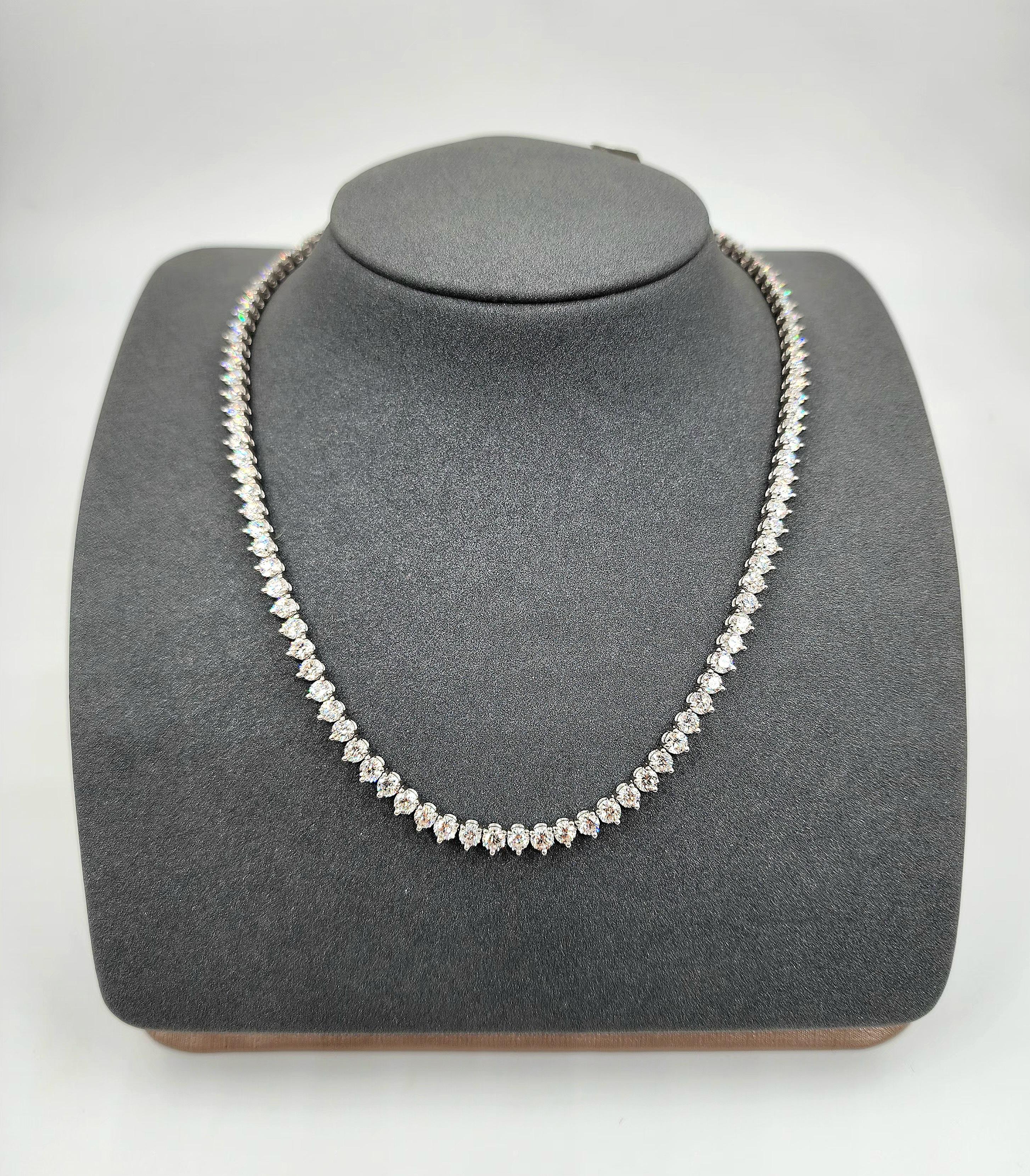 This necklace features 17.75 carats of round-cut diamonds, each with a white hue and VS1 clarity. The diamonds are graded G for color, offering a stunning brilliance. Set in platinum, this piece embodies a modern design. Crafted in the United States