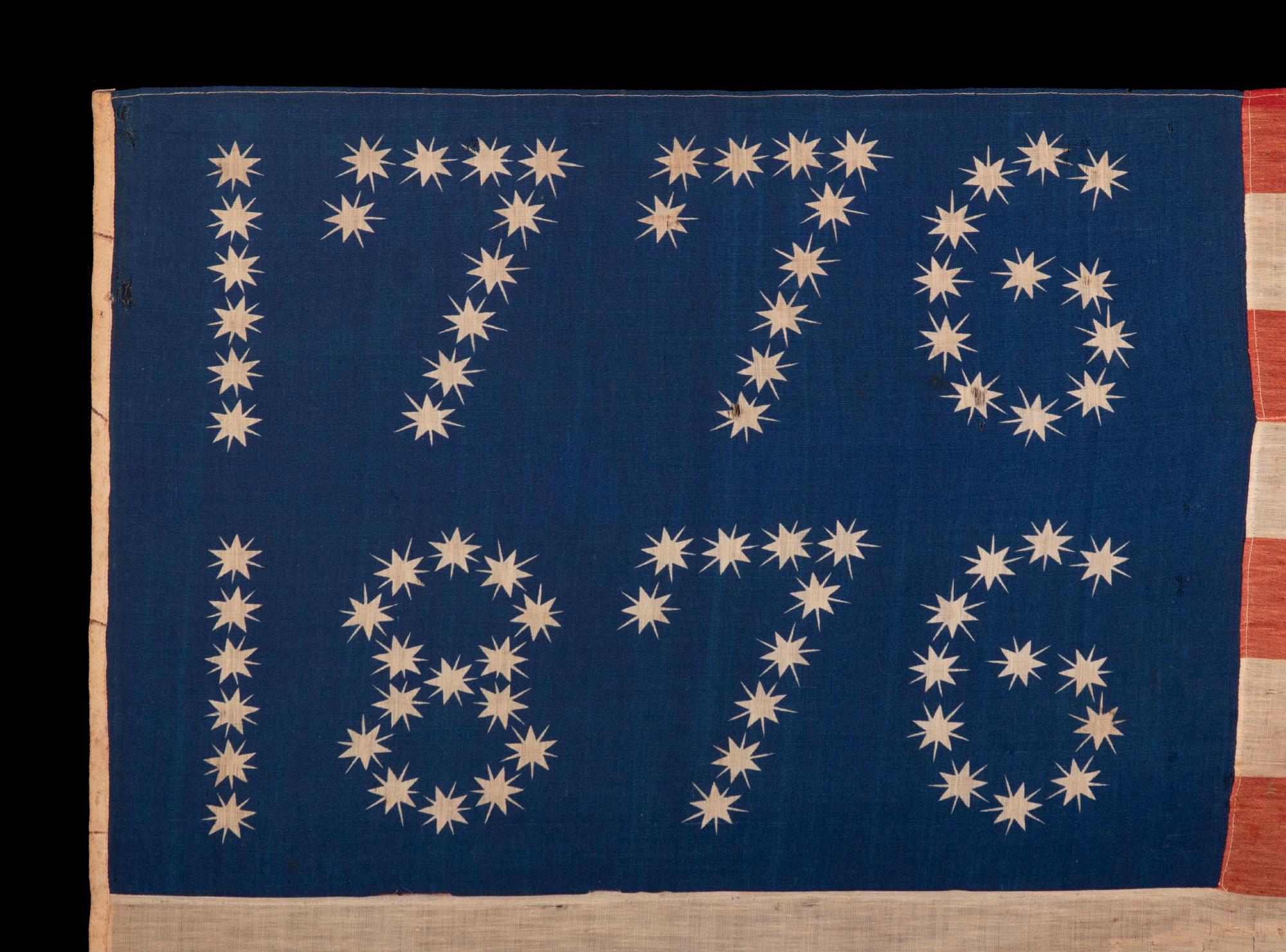 Antique American Flag with 10-pointed stars that spell “1776 – 1876”, Made for the 100-Year Anniversary Of American Independence,one of the most graphic of all early examples.

Many fantastic star patterns were made in the patriotism that