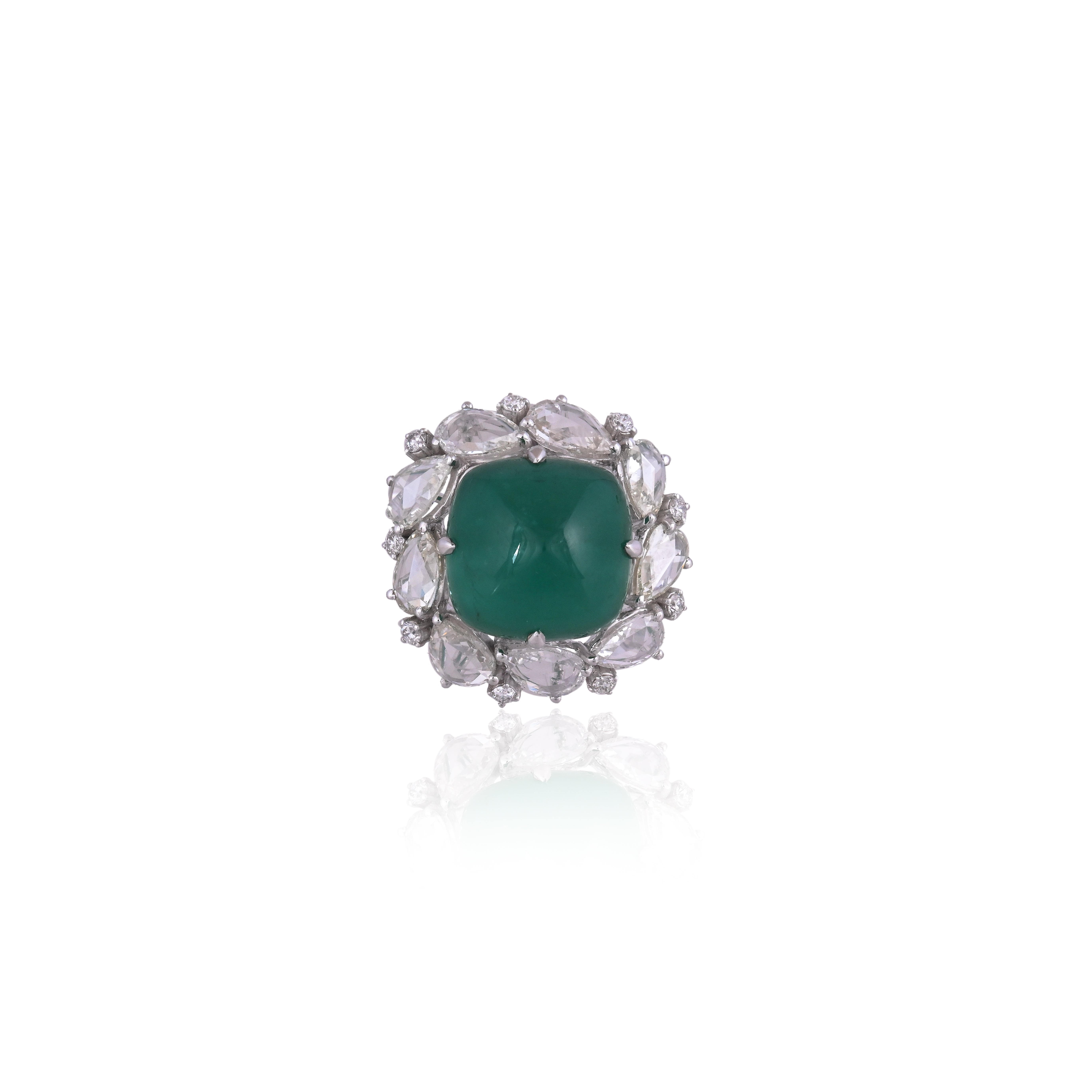 A very gorgeous and beautiful, one of a kind, Emerald Sugarloaf Cocktail Dome Ring set in 18K White Gold & natural Diamonds. The weight of the Emerald Sugarloaf is 17.79 carats. The Emerald is completely natural, without any treatment and is of
