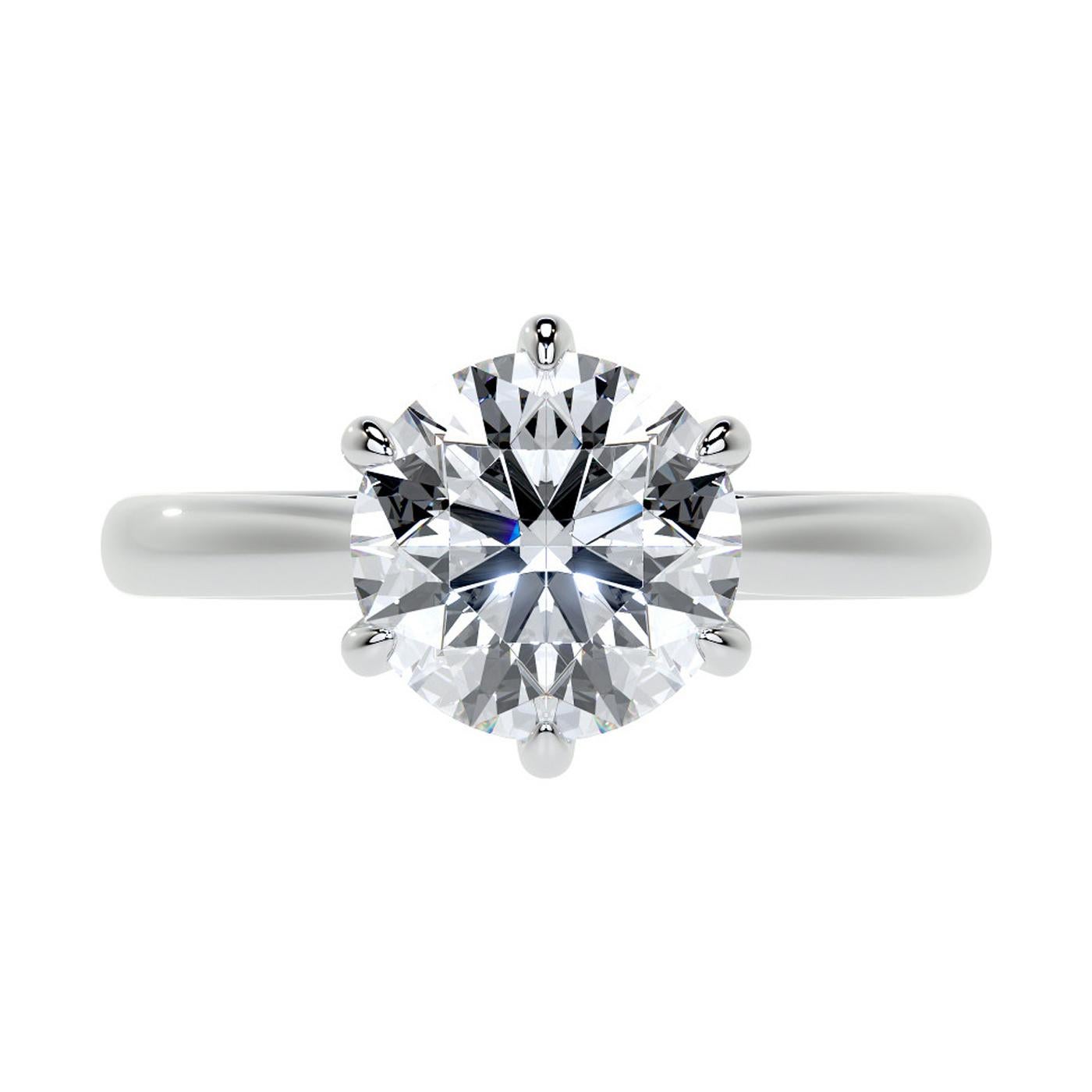 This stunning solitaire engagement ring features a GIA-certified round brilliant cut diamond in a six-prong platinum setting. The diamond in this ring is weighing 1.77 carats round brilliant cut with I color and VS1 clarity, This is the perfect gift