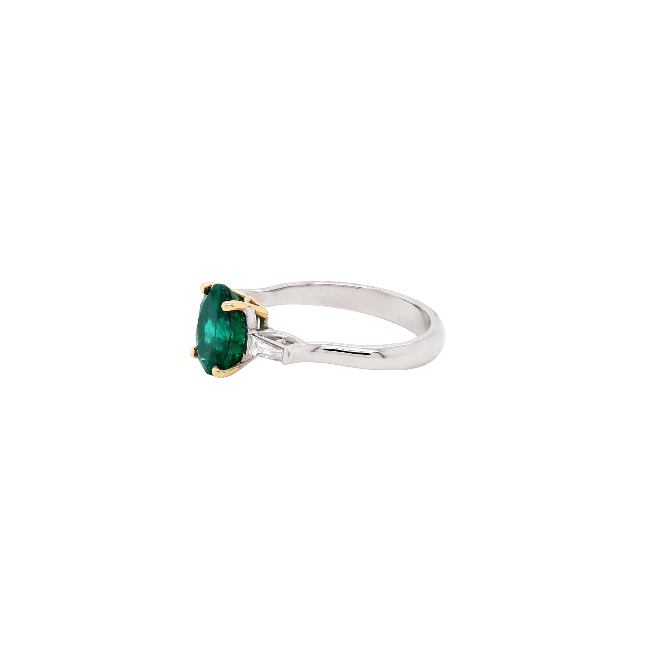 Modern 1.77 Carat Oval Emerald and Diamond platinum and 18 Carat Gold Engagement Ring For Sale