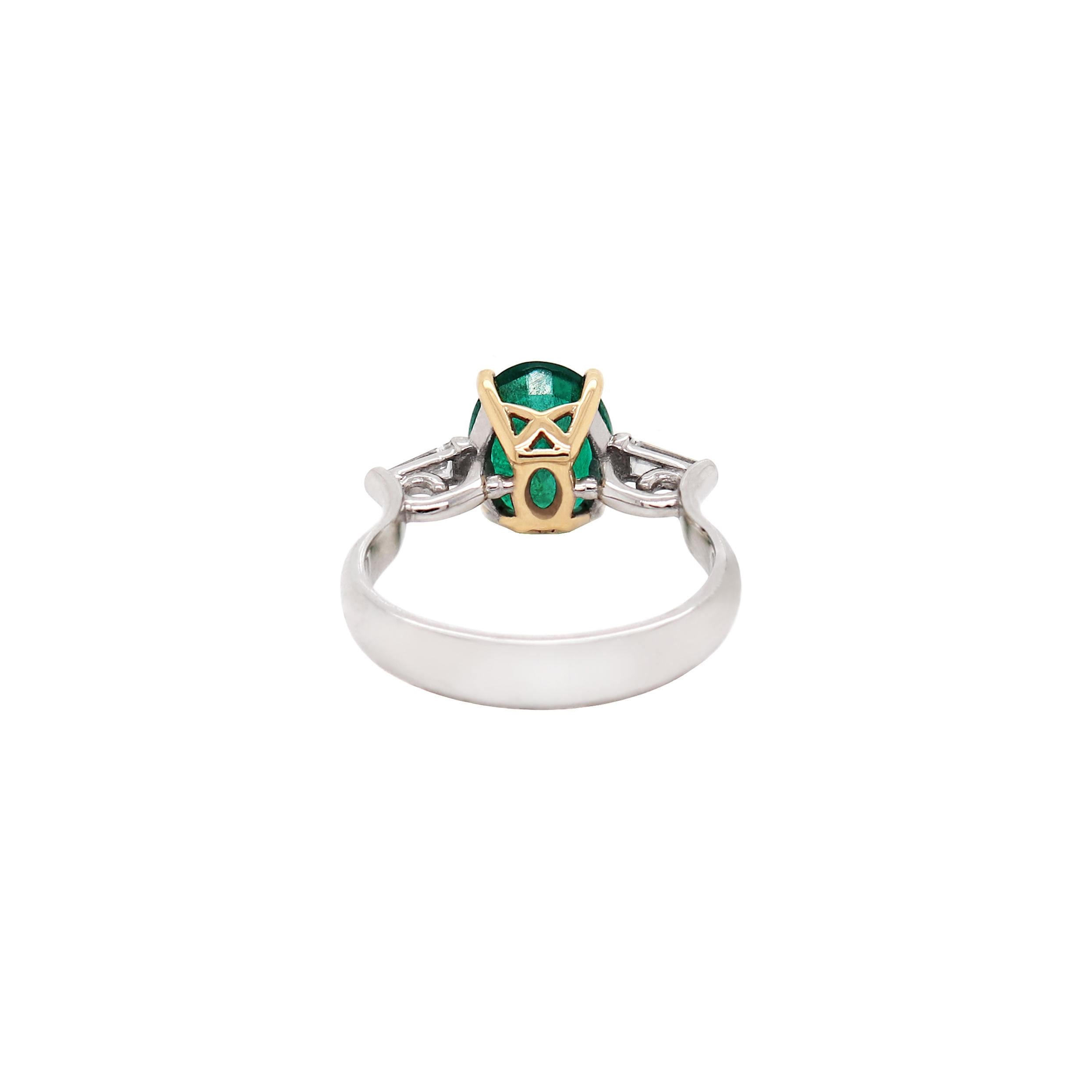 Oval Cut 1.77 Carat Oval Emerald and Diamond platinum and 18 Carat Gold Engagement Ring For Sale
