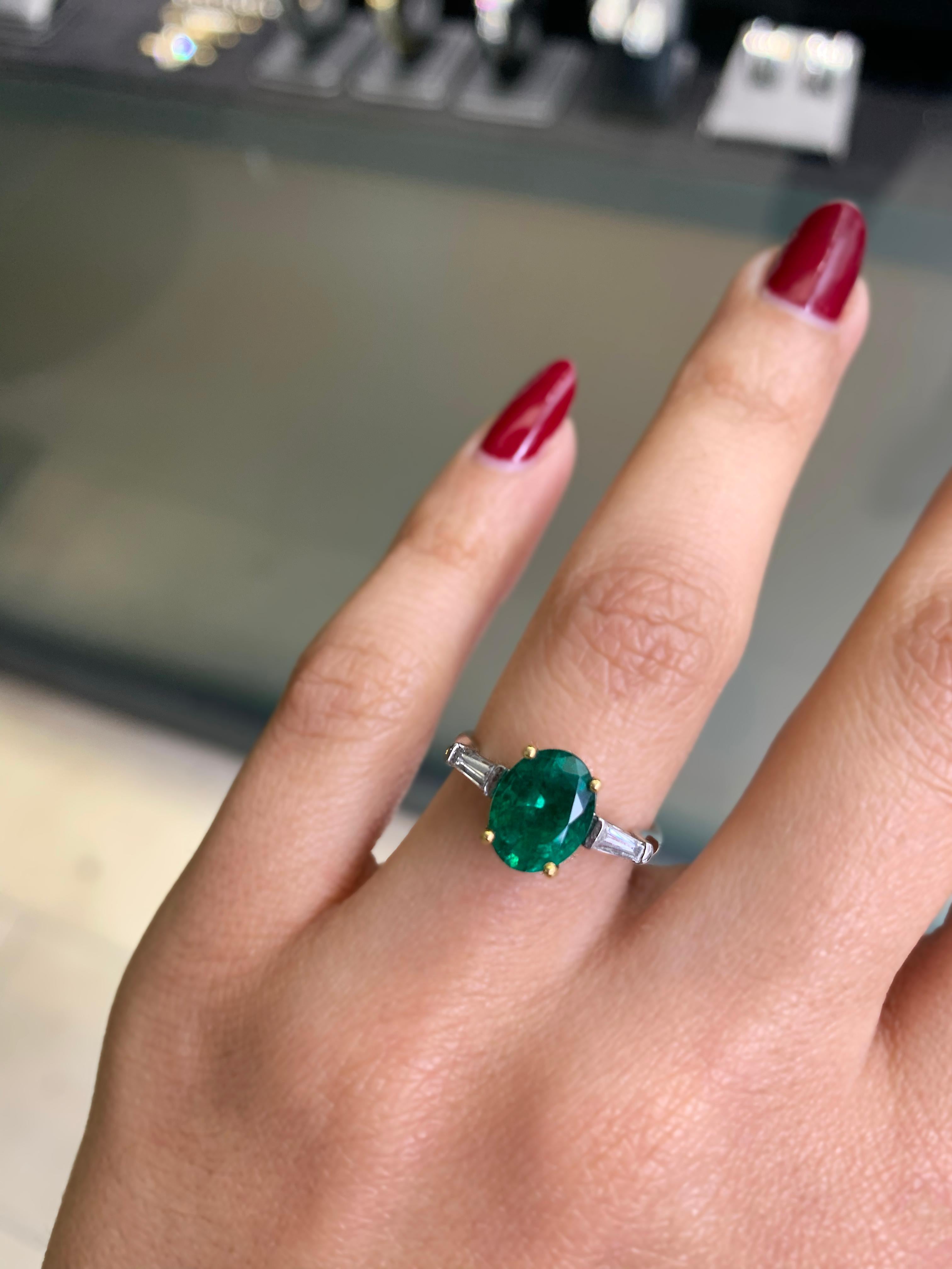 Women's 1.77 Carat Oval Emerald and Diamond platinum and 18 Carat Gold Engagement Ring For Sale