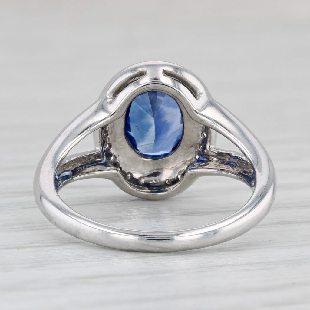 Taglio ovale Anello con diamante e zaffiro blu ovale da 1,77 carati in oro bianco 18 carati, misura 6,25 in vendita