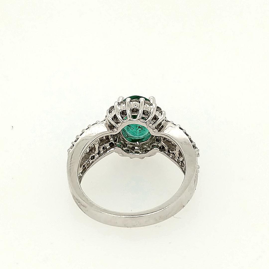 Oval Cut 1.78 Carat Emerald and Diamond Cocktail Ring For Sale